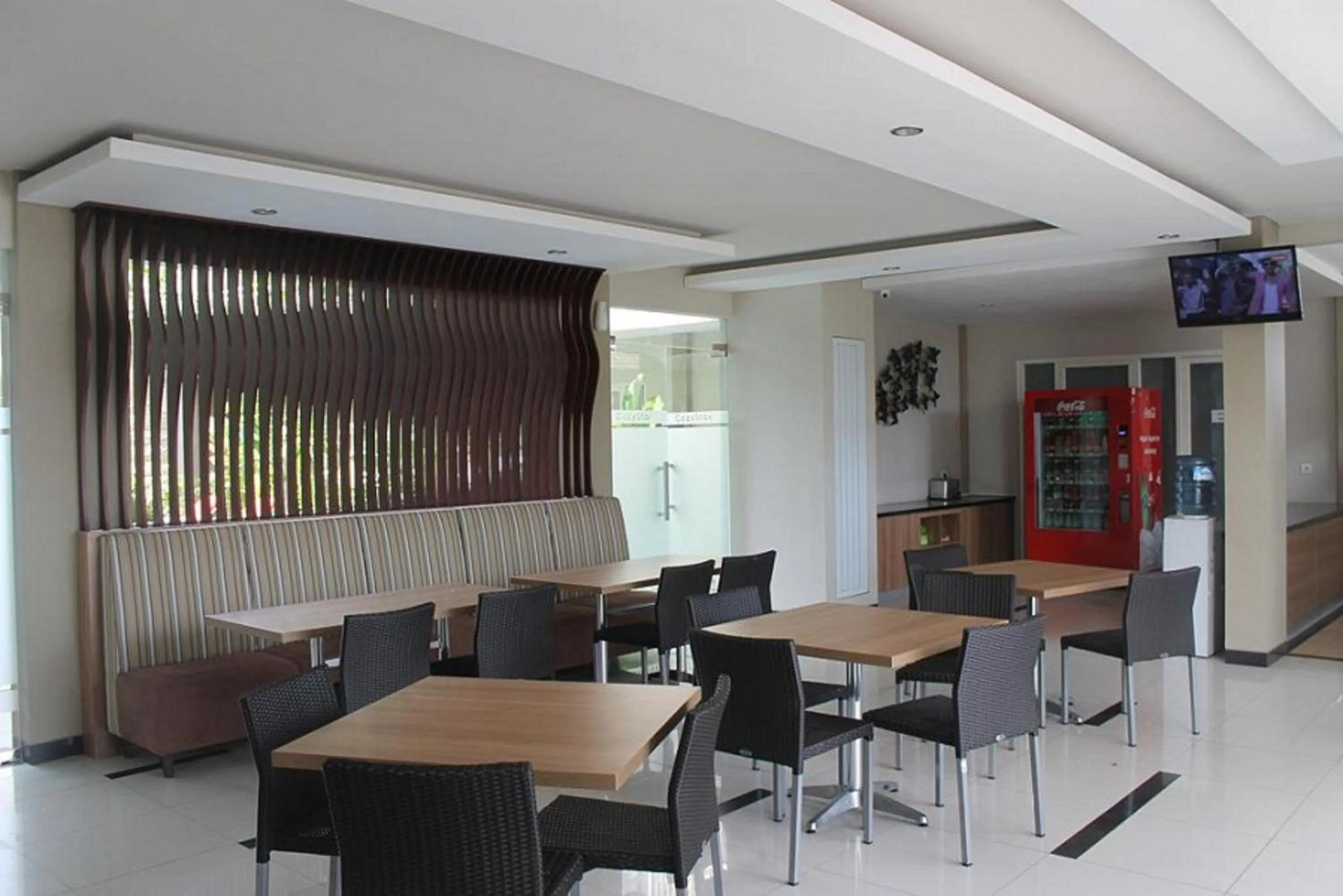 Communal lounge/ TV room in Choice Stay Hotel Denpasar