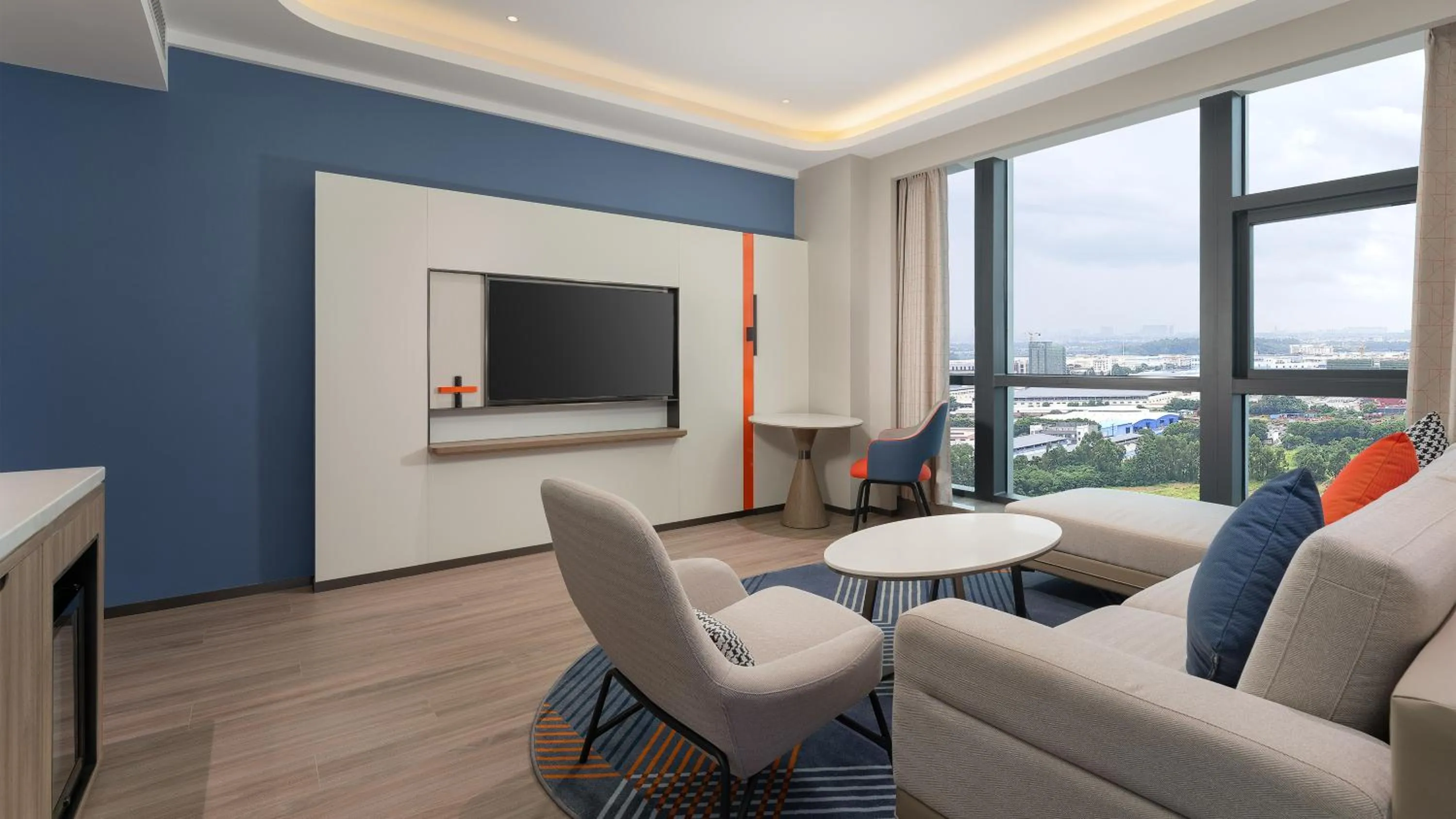 Living room in Holiday Inn Express Foshan Sanshui by IHG