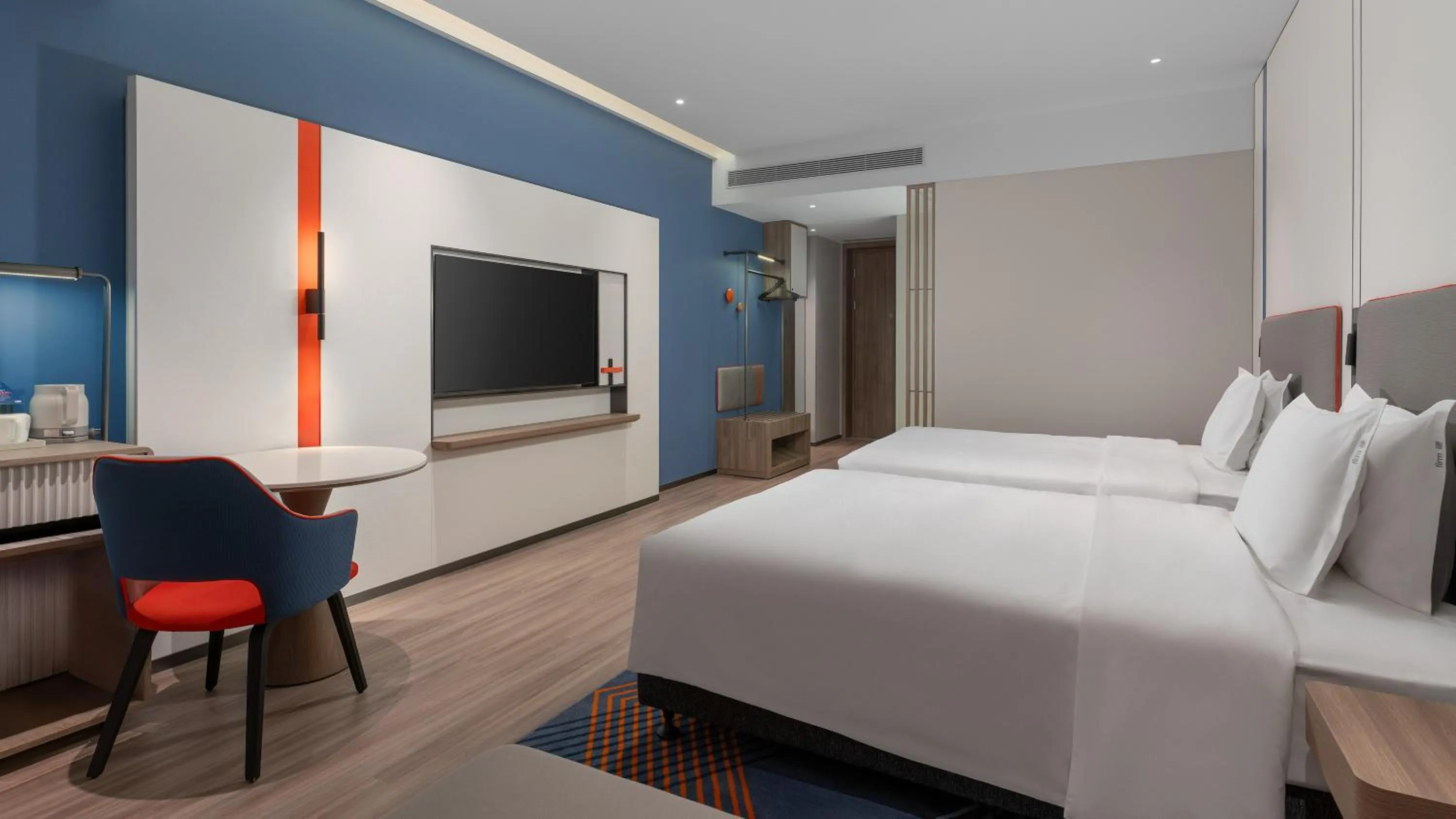 Bed in Holiday Inn Express Foshan Sanshui by IHG