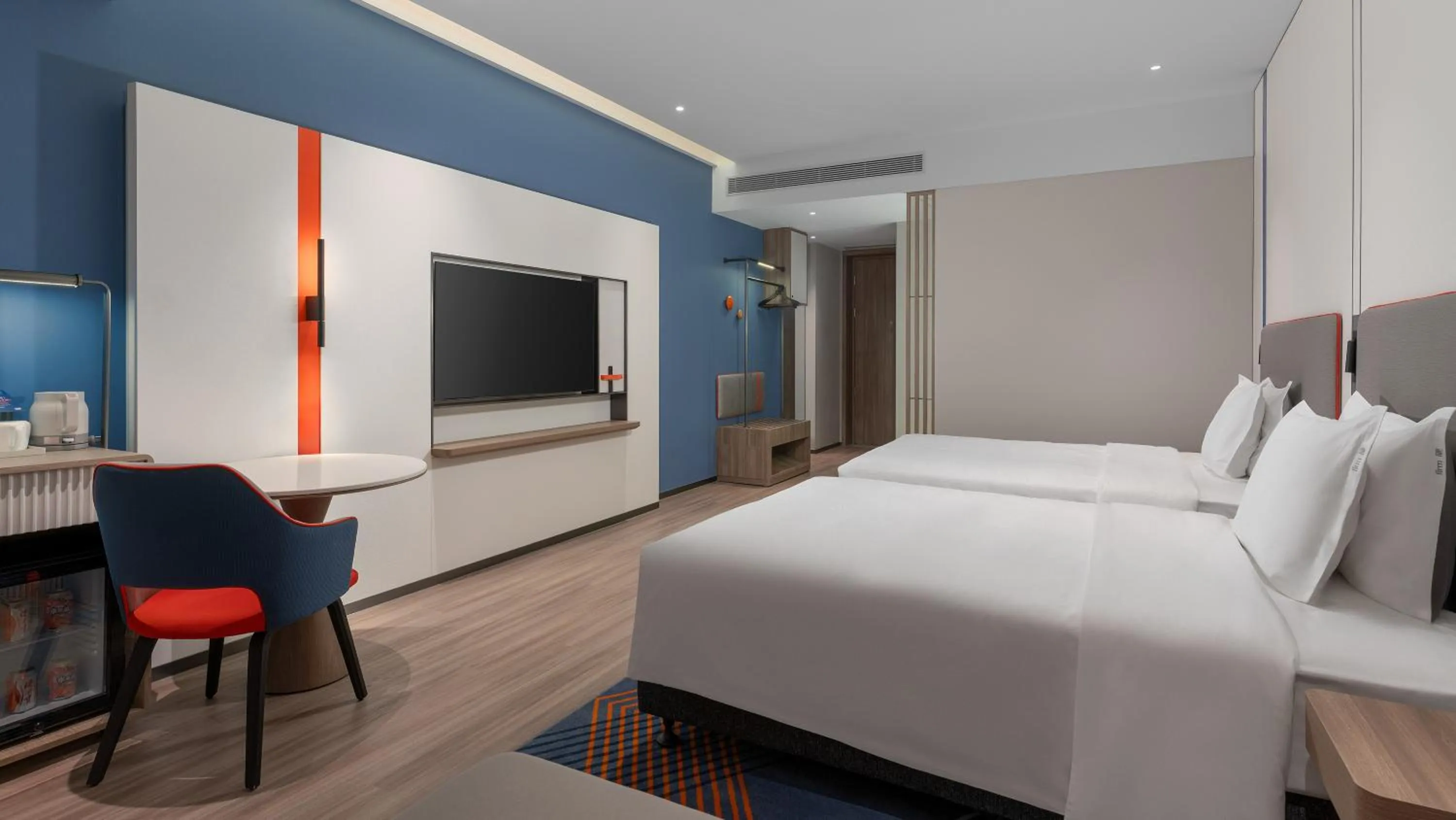 Bed in Holiday Inn Express Foshan Sanshui by IHG