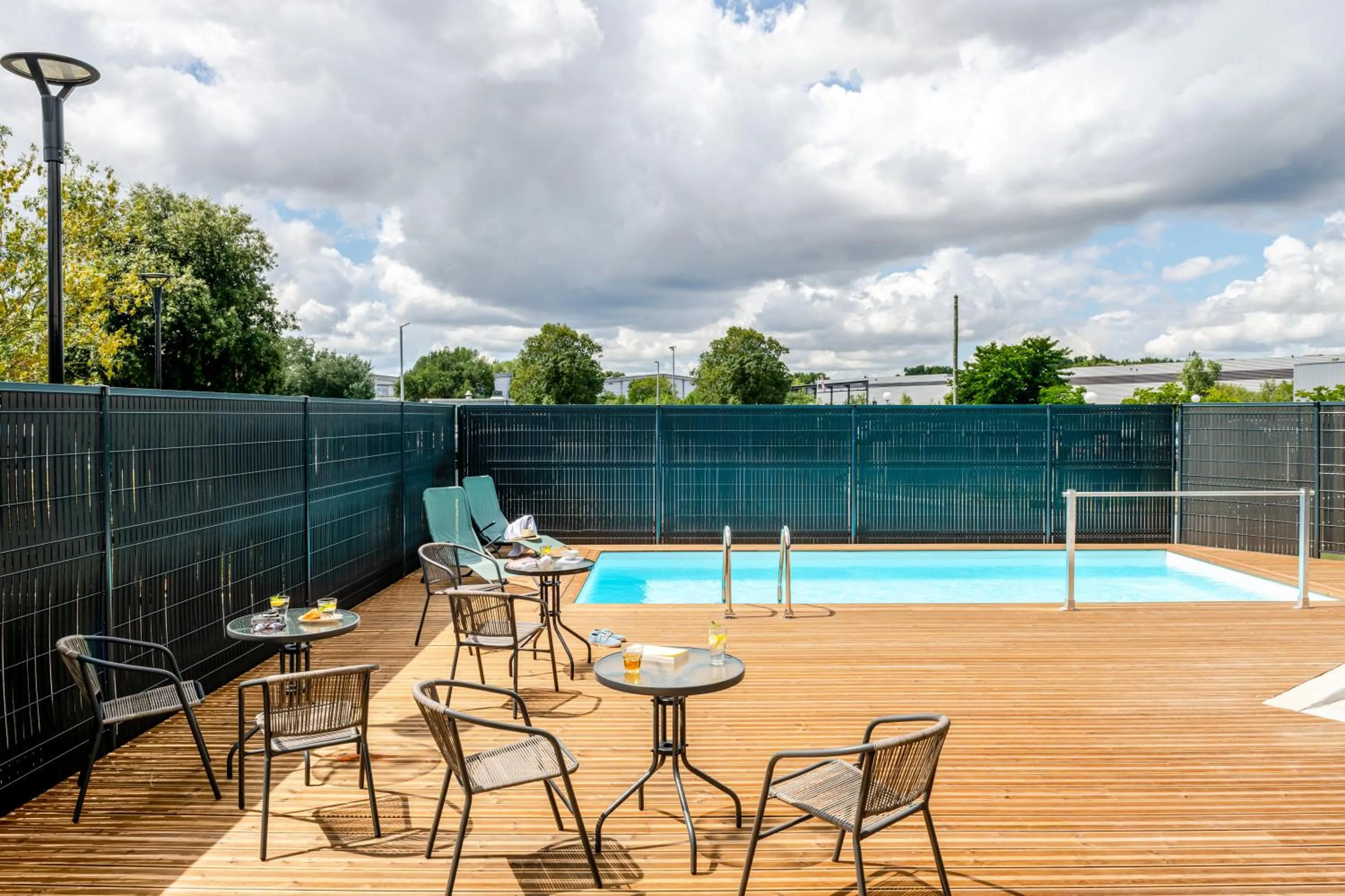 Pool view in ibis Bordeaux Nord Carbon Blanc