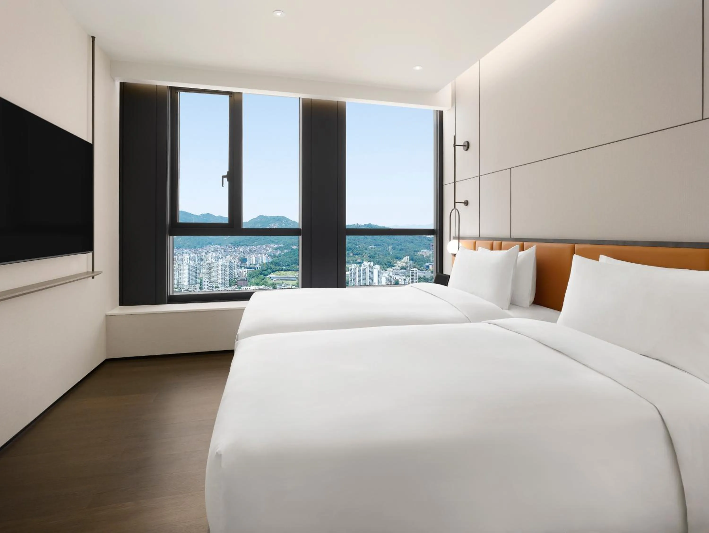 Bed in Pullman Ambassador Seoul Eastpole