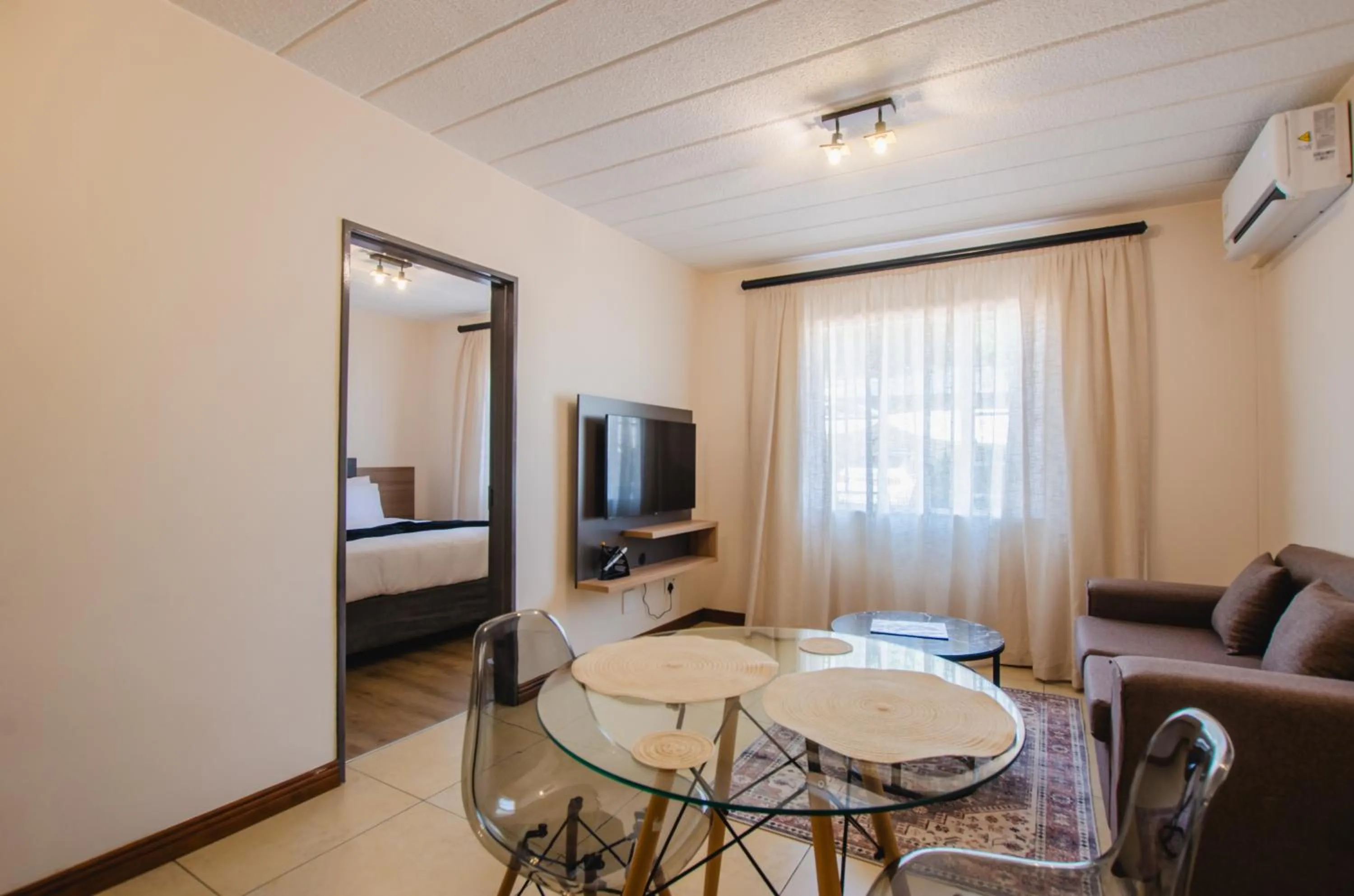 Communal lounge/ TV room, Bed in Melrose Corner Self-Catering Hotel Apartments