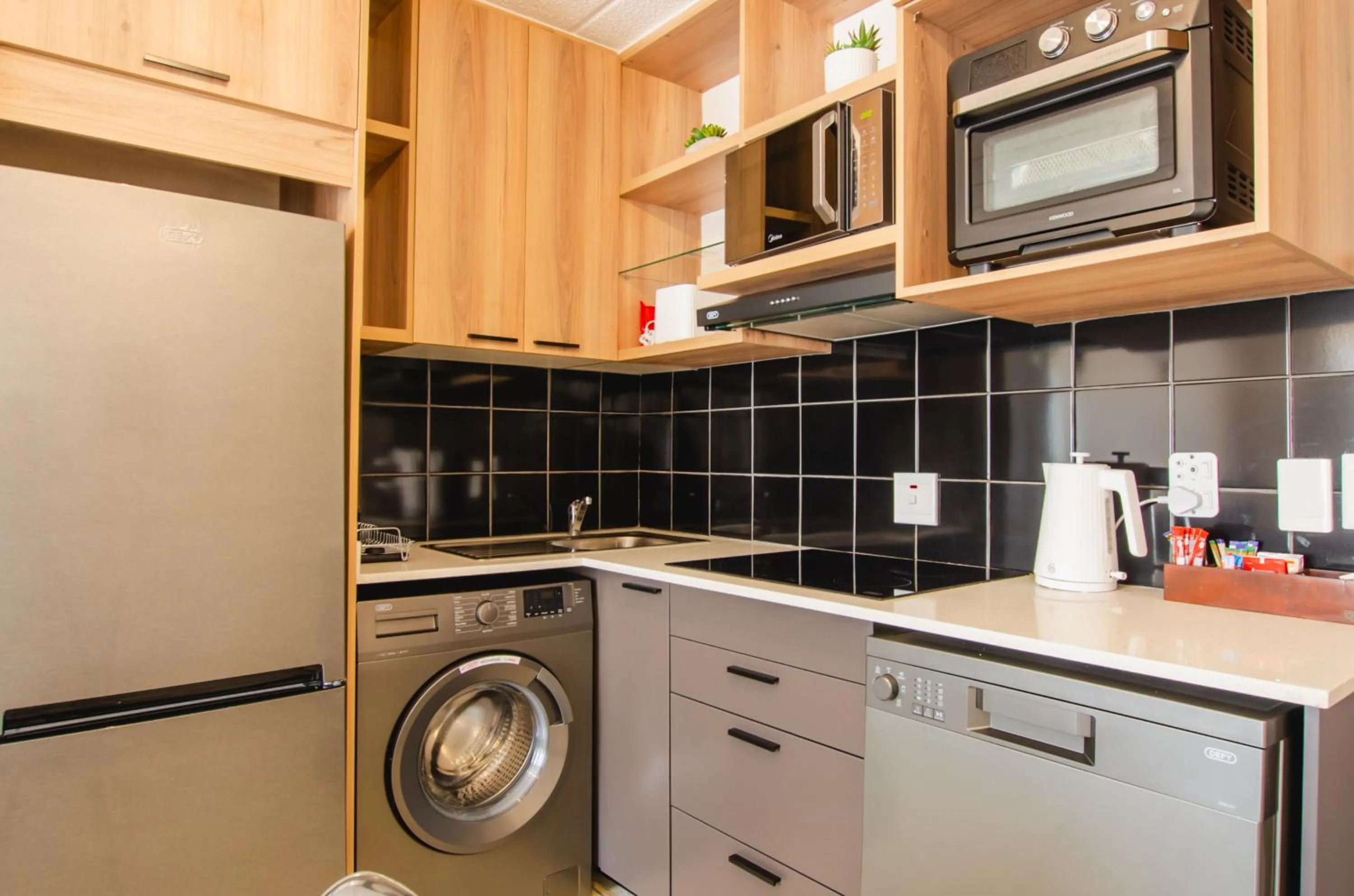 Kitchen or kitchenette in Melrose Corner Self-Catering Hotel Apartments