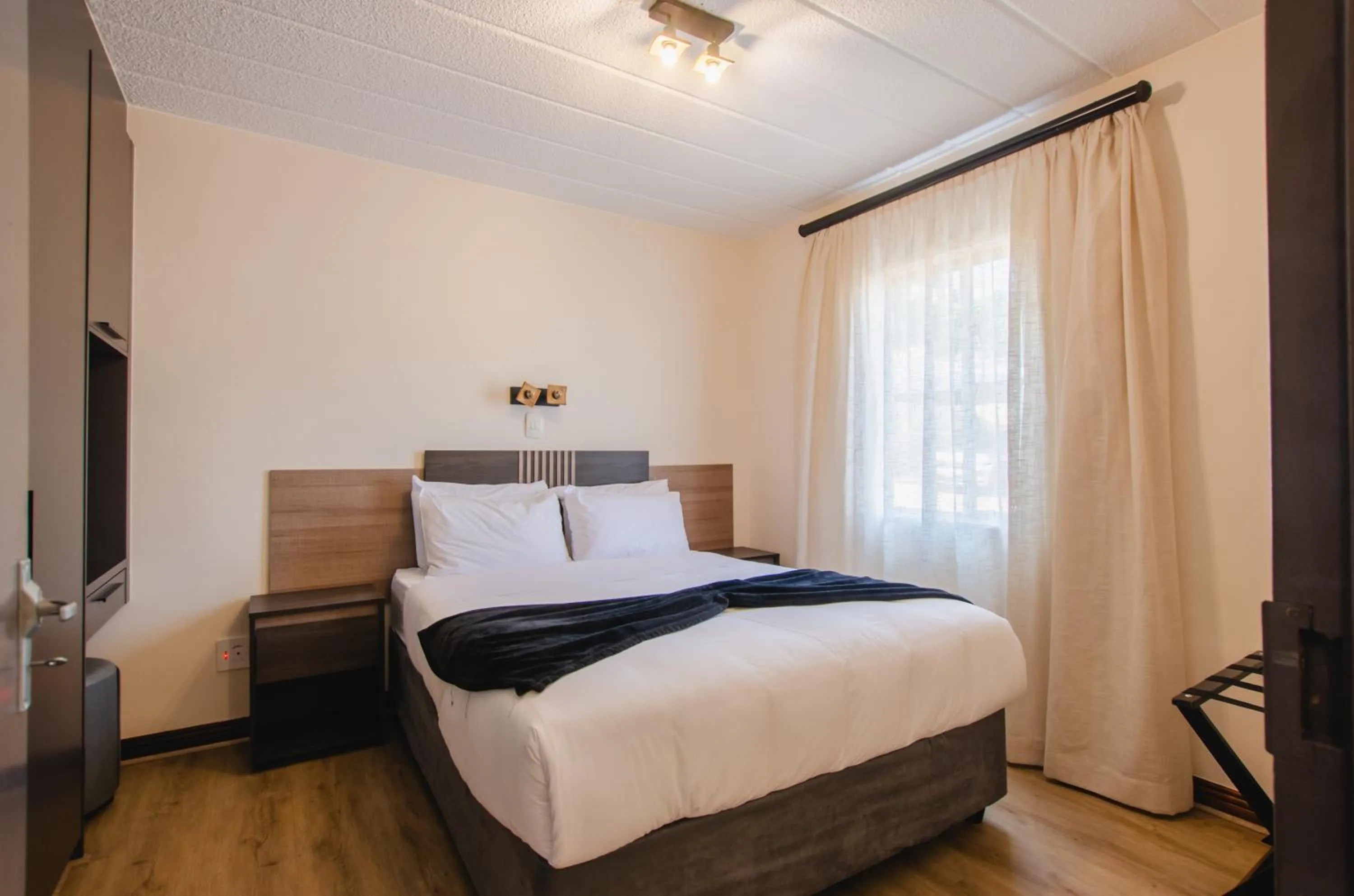 Bed in Melrose Corner Self-Catering Hotel Apartments