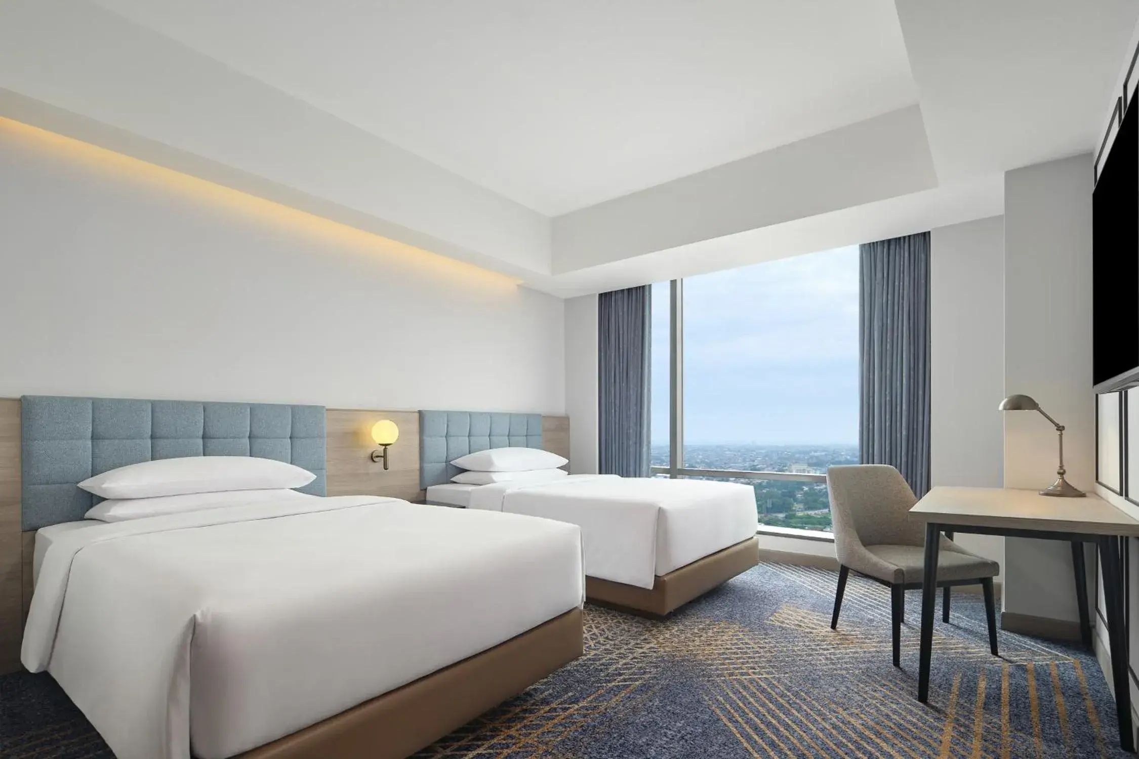 Deluxe Double Room with Two Double Beds and City View in Four Points by Sheraton Bekasi Deluxe Double Room with Two Double Beds and City View in Four Points by Sheraton Bekasi