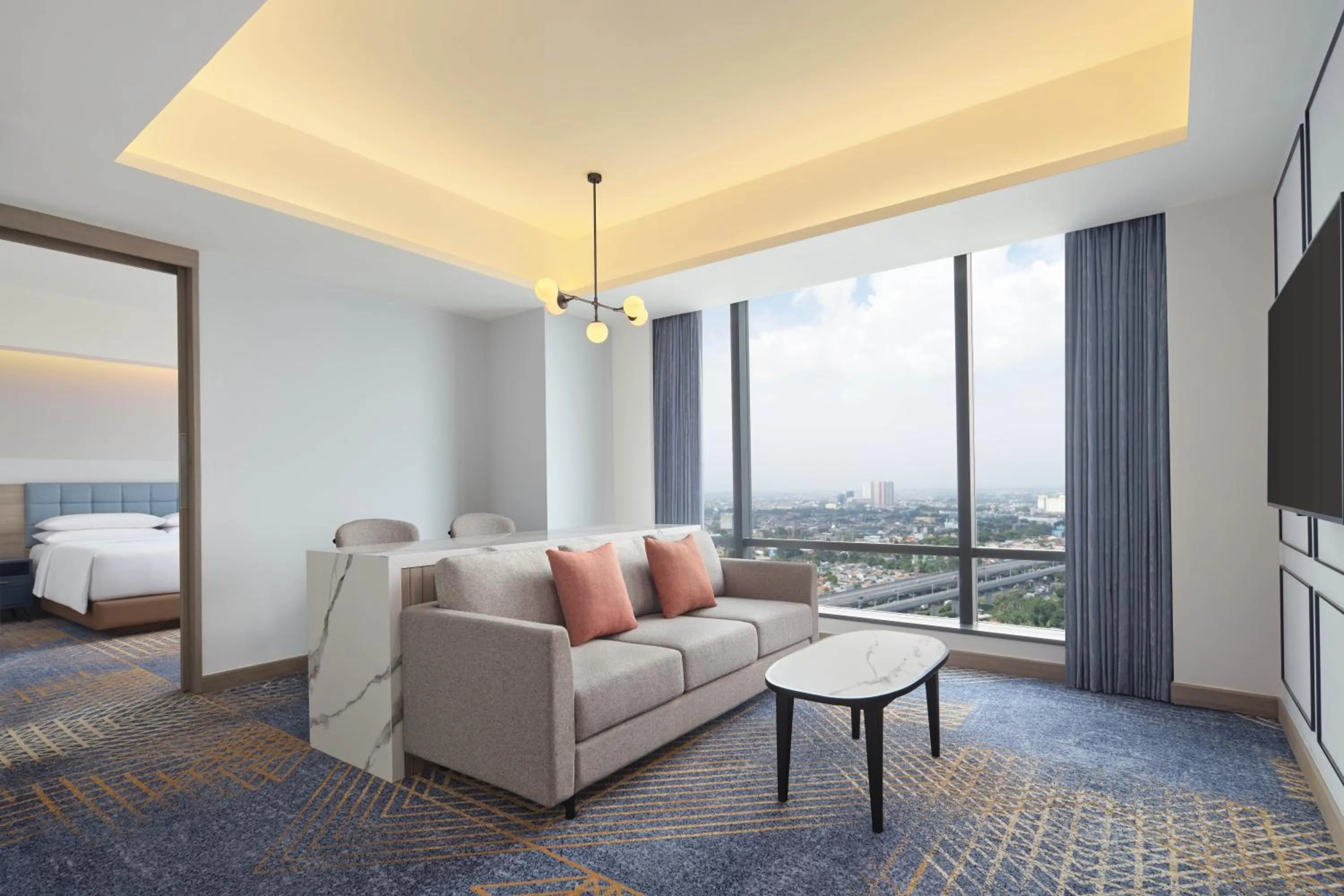 Living room, Bed in Four Points by Sheraton Bekasi