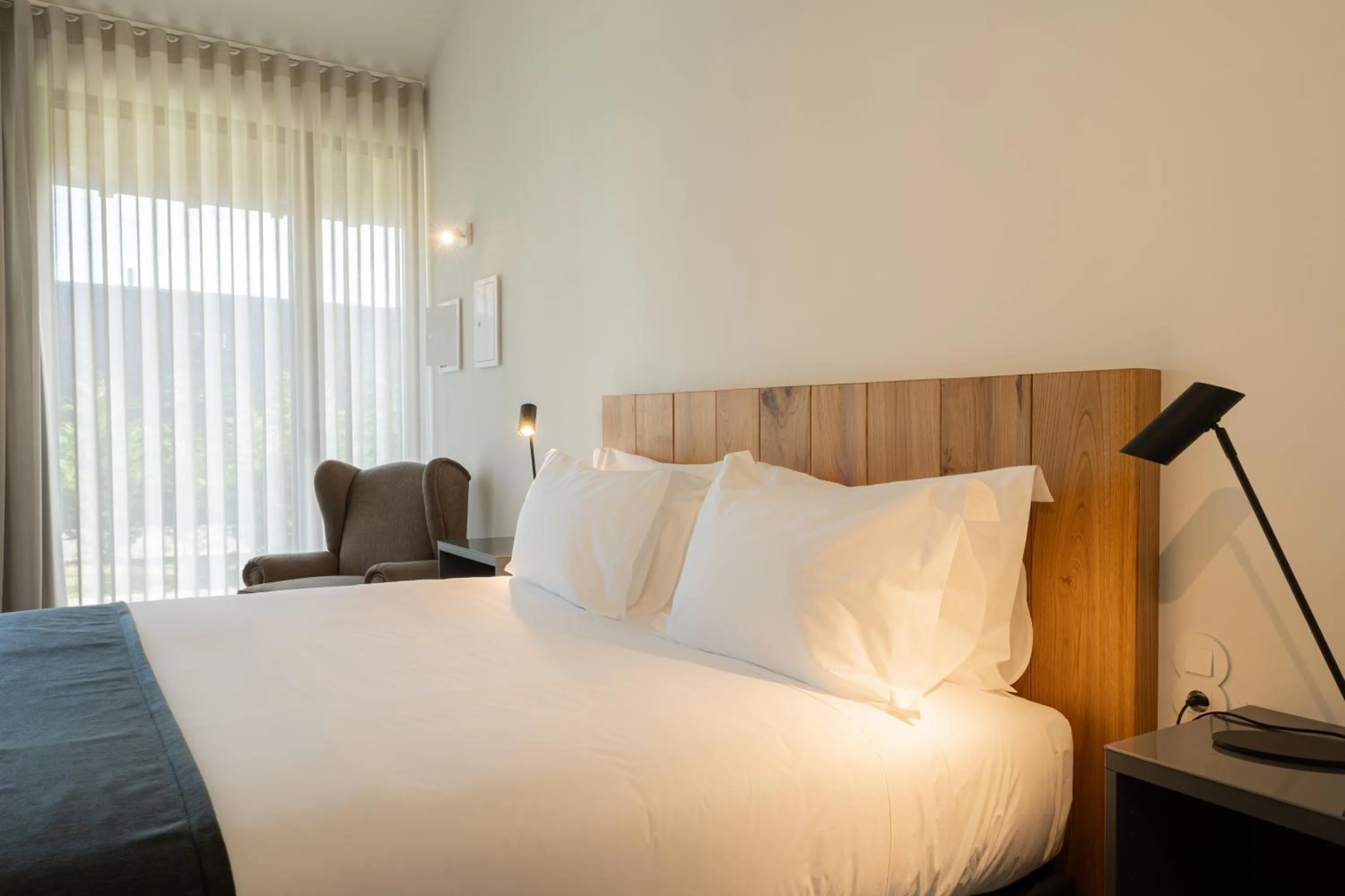 Bed in CasaNova Farmhouse