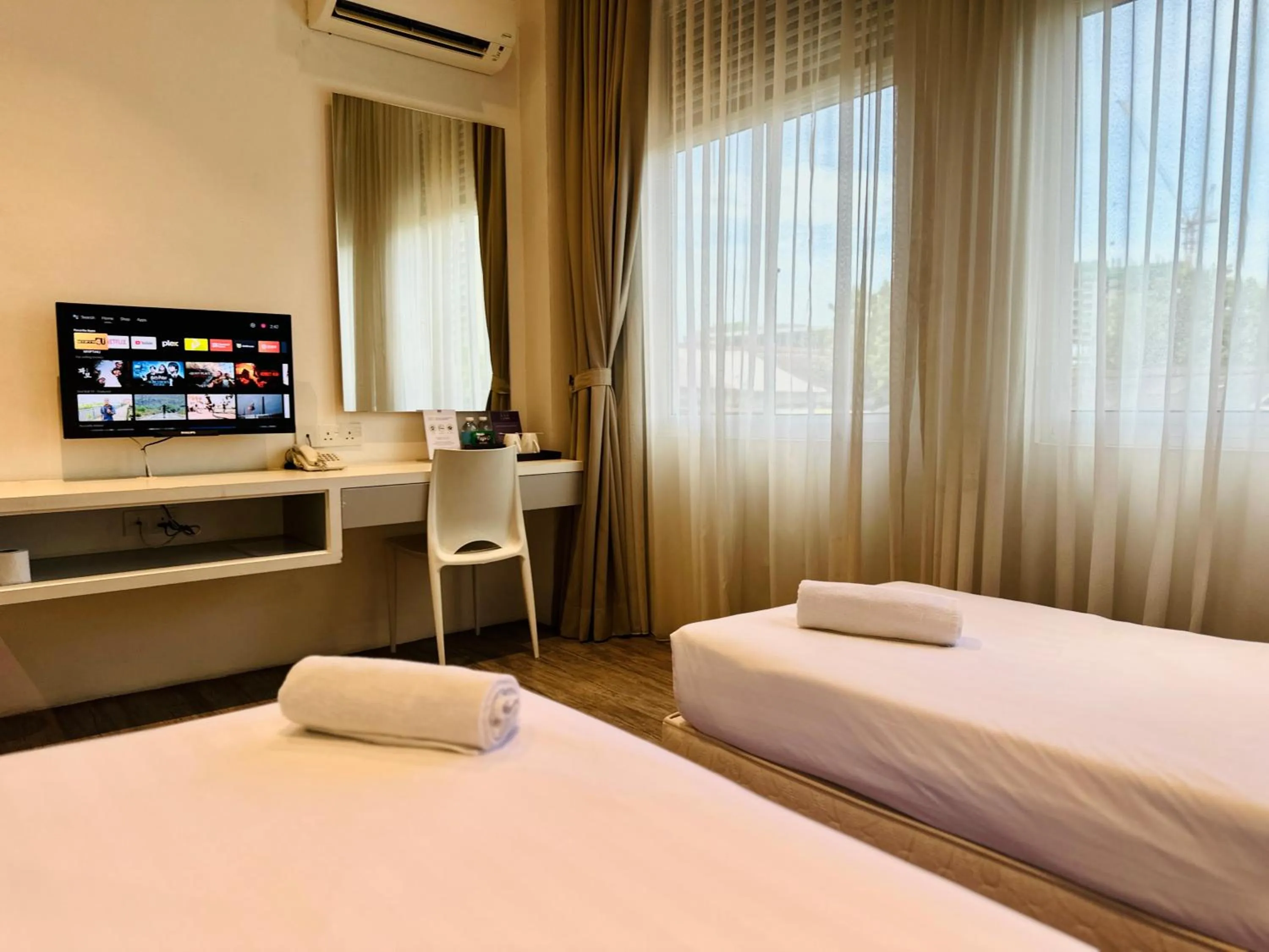 Bed in C Y C Heritage Hotel