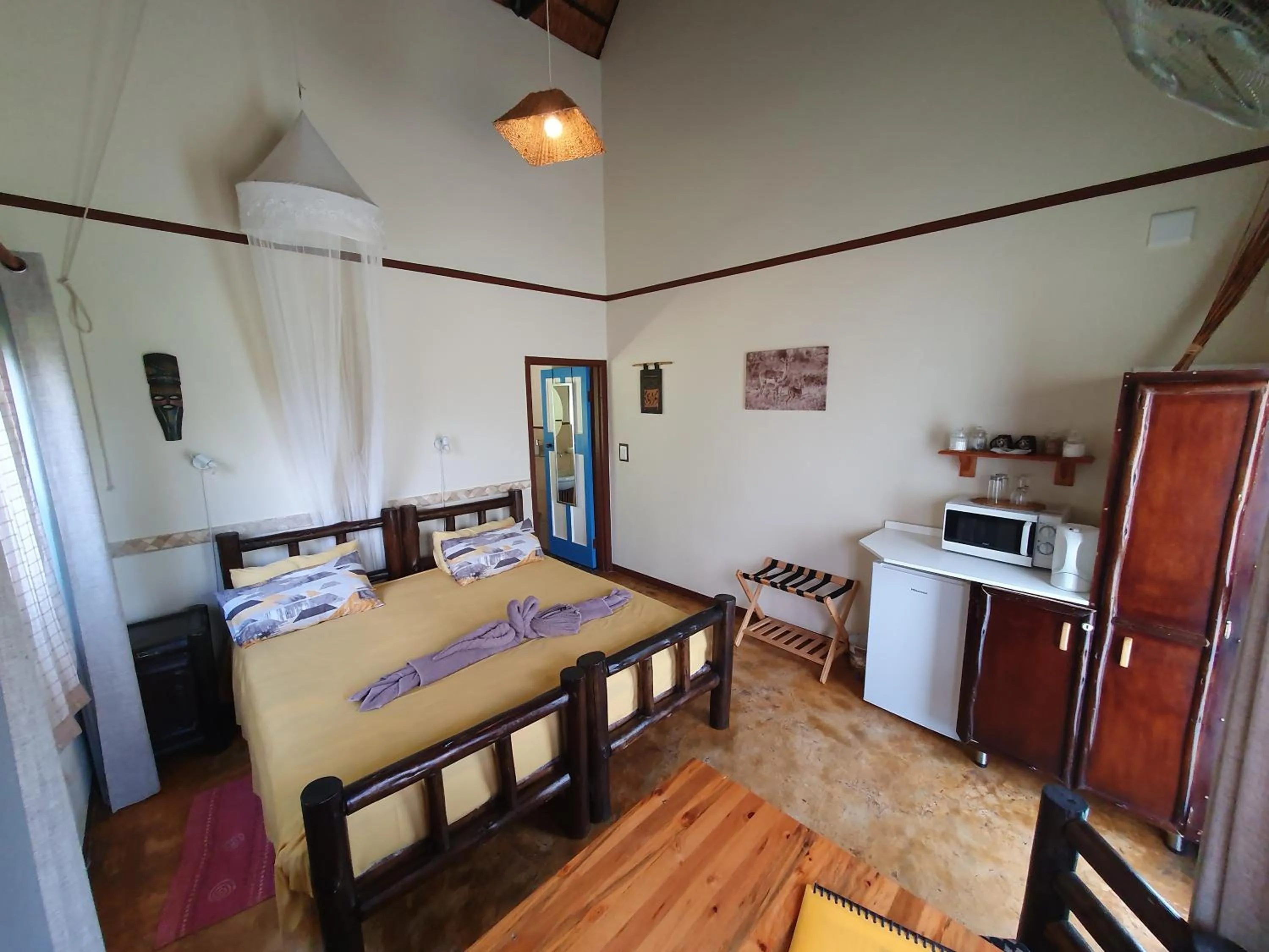 Photo of the whole room, Bed in Thokozani Lodge