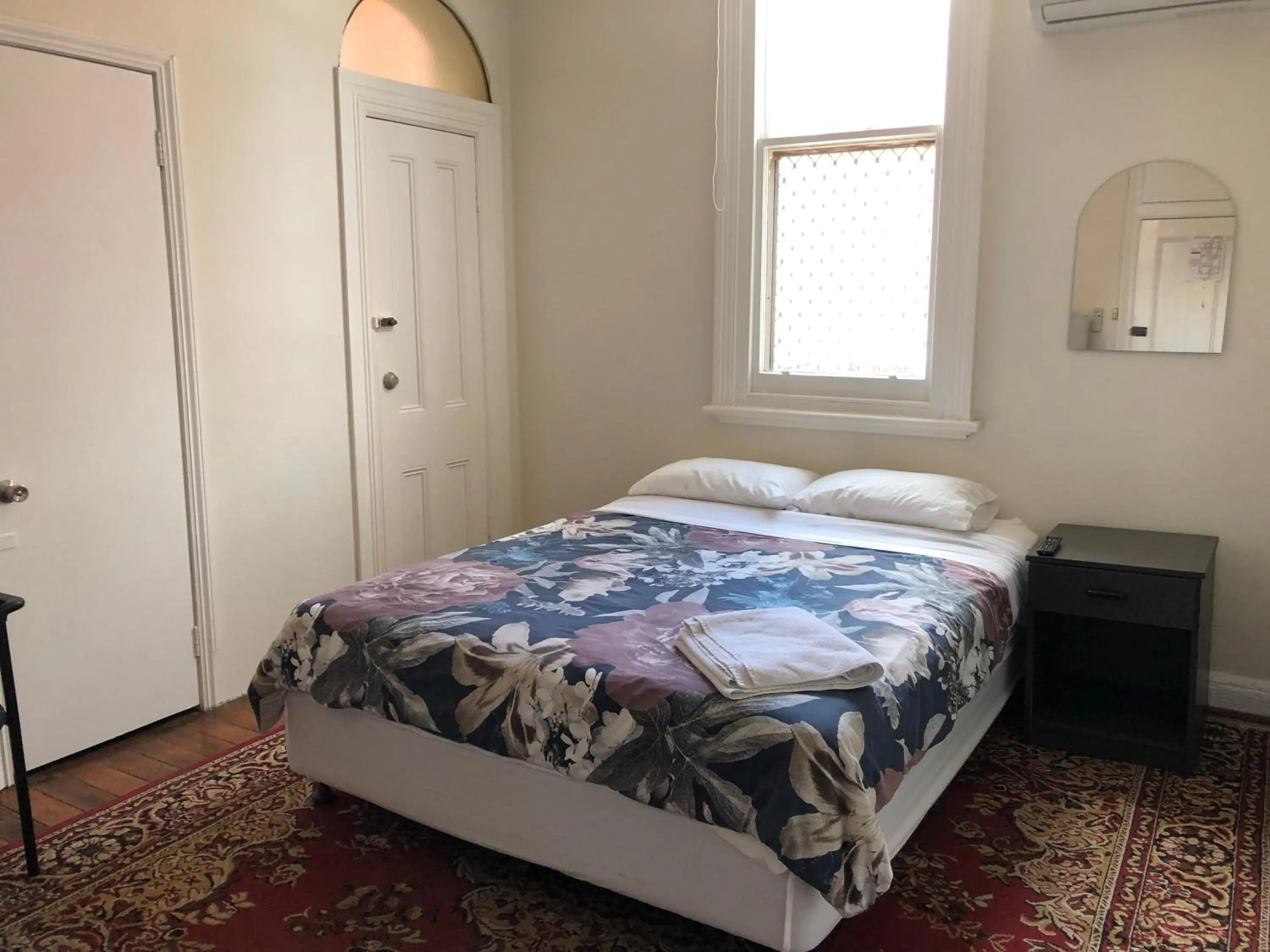 Bed in Northlodge Central City Apartments