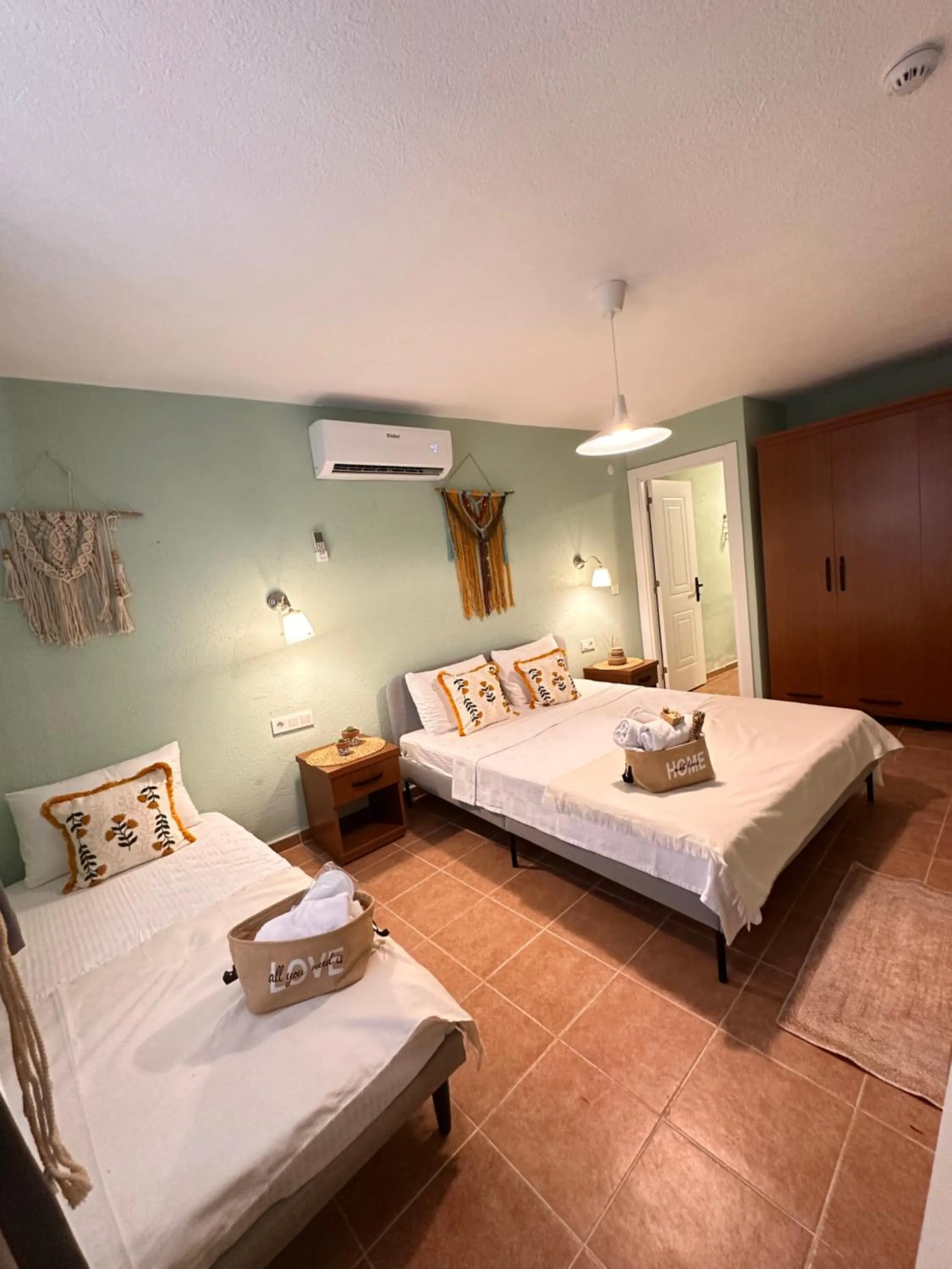 Bed in Hanole Macaron Guest House