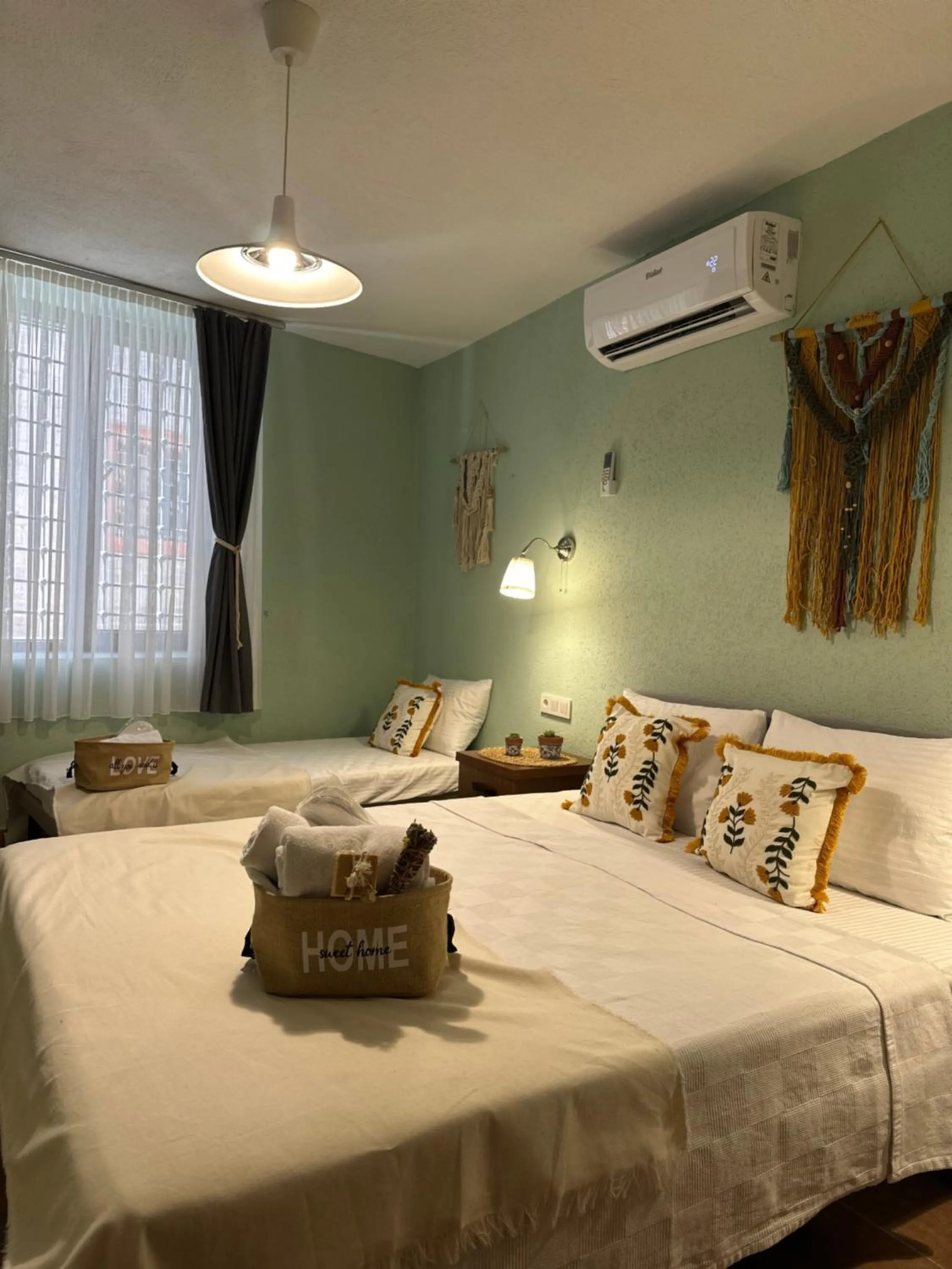 Bed in Hanole Macaron Guest House