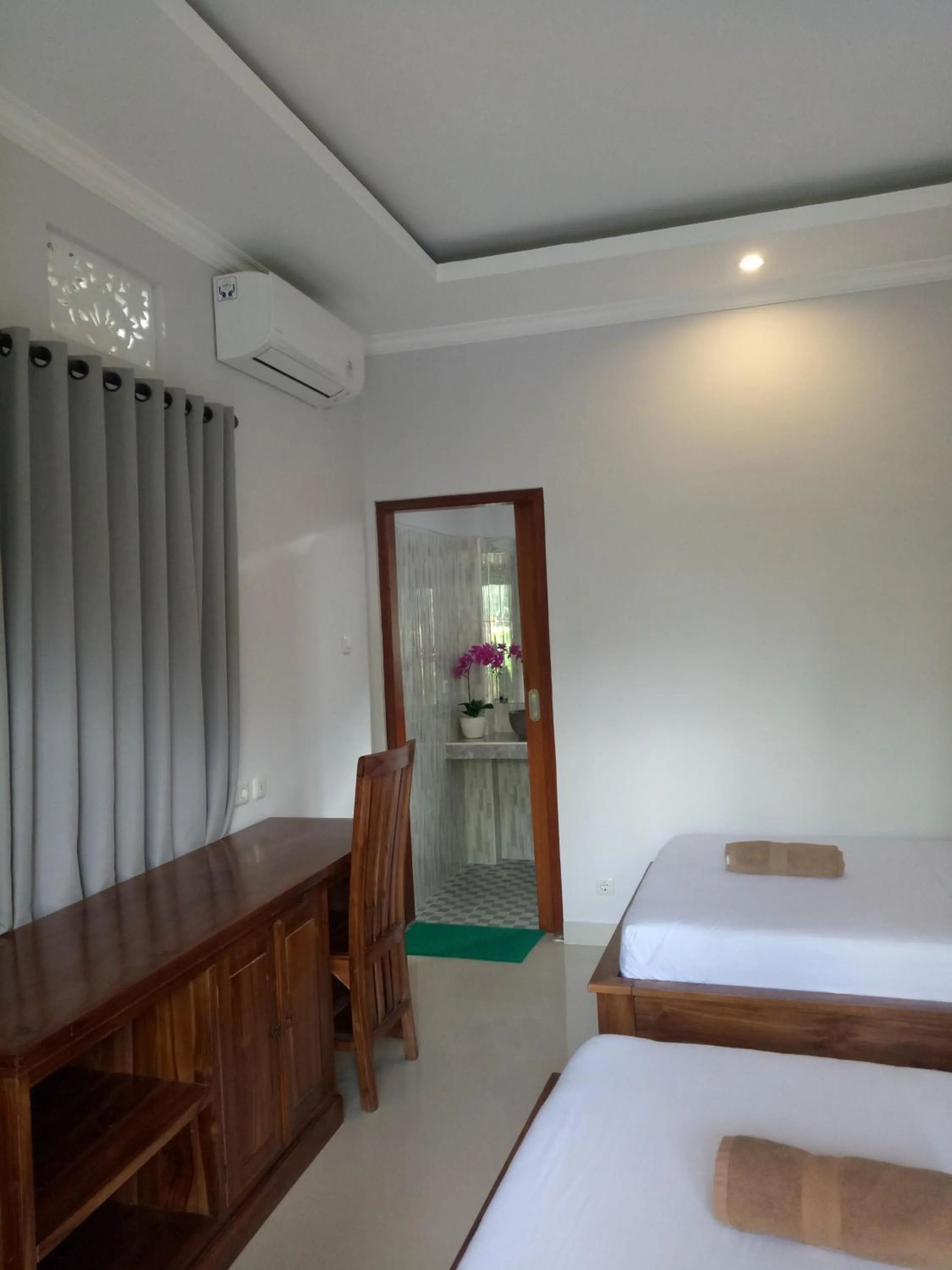 Bed in Suryadina Guest House