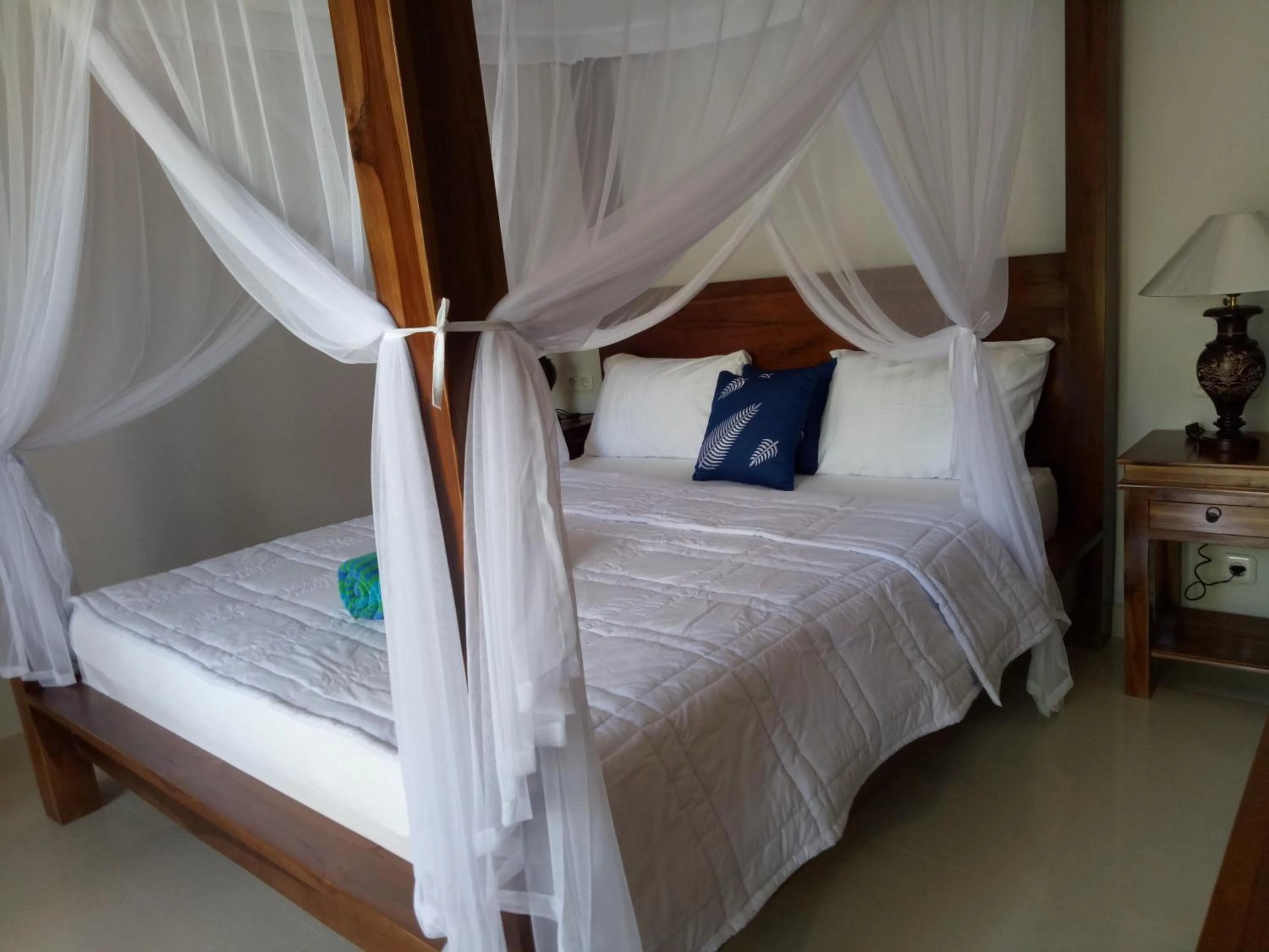 Bed in Suryadina Guest House