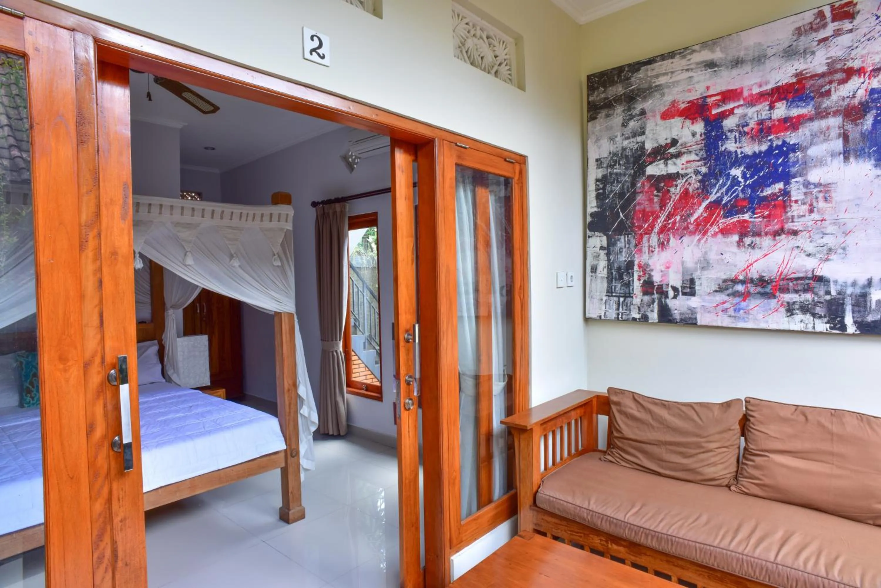 Photo of the whole room, Bed in Suryadina Guest House