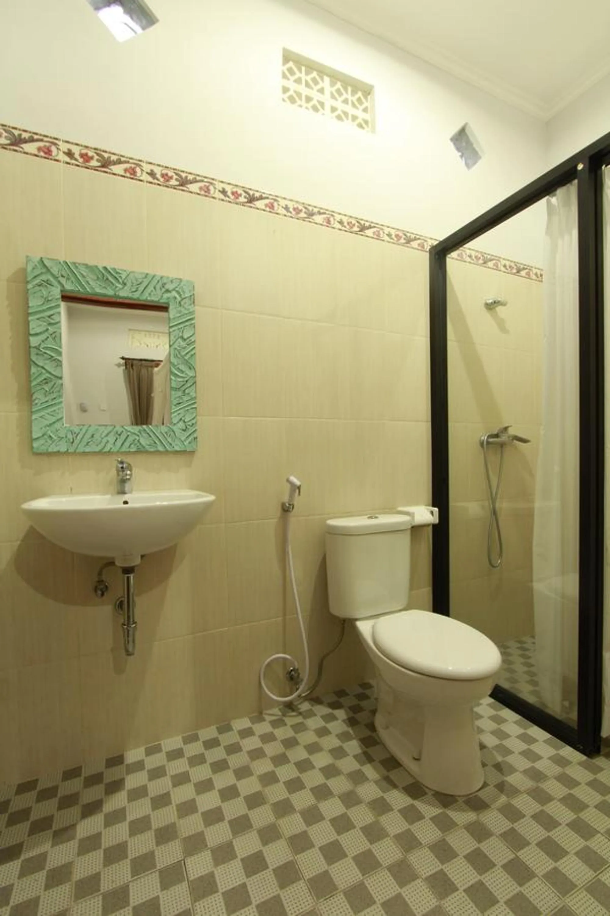 Bathroom in Suryadina Guest House