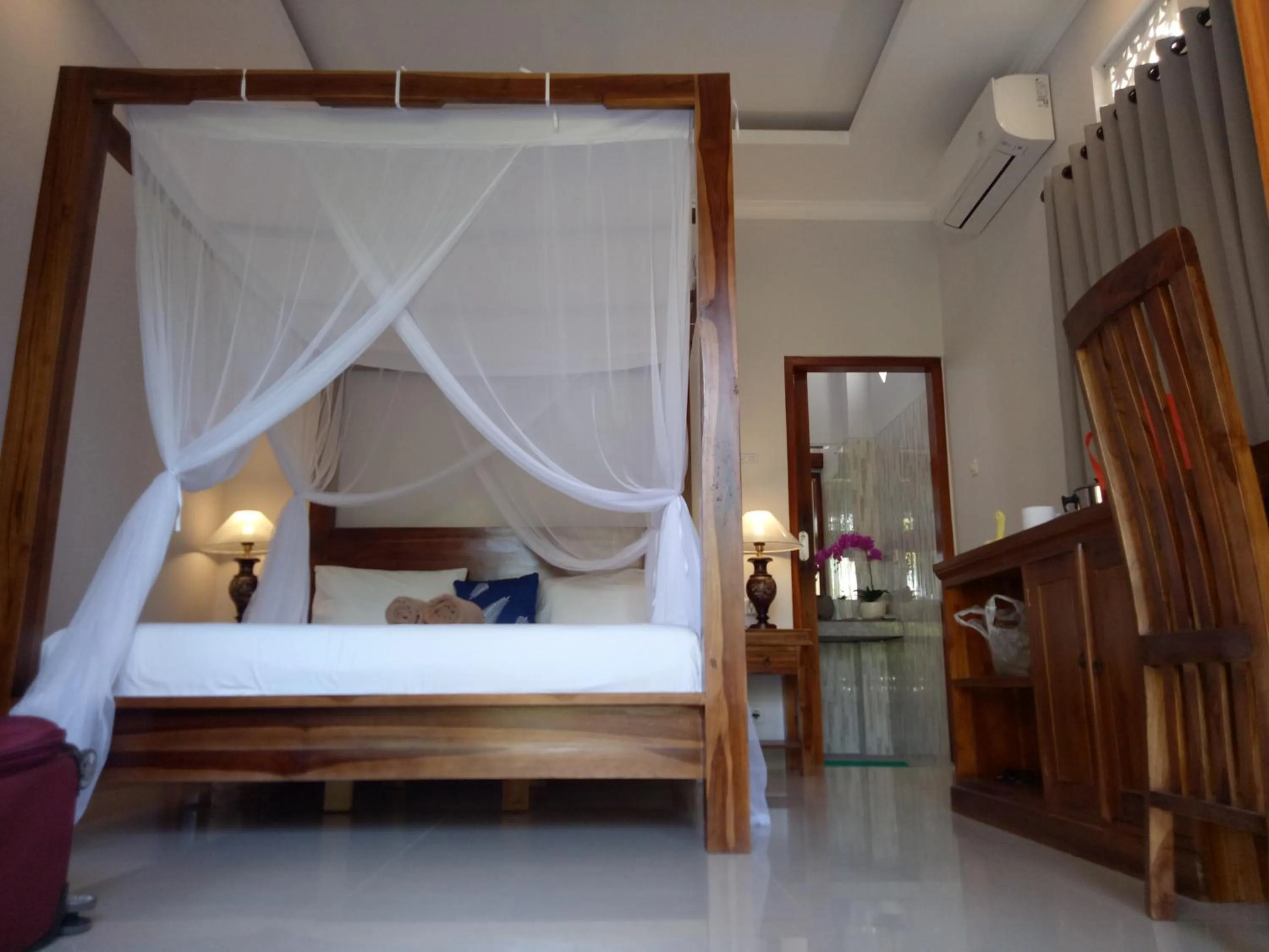 Bed in Suryadina Guest House