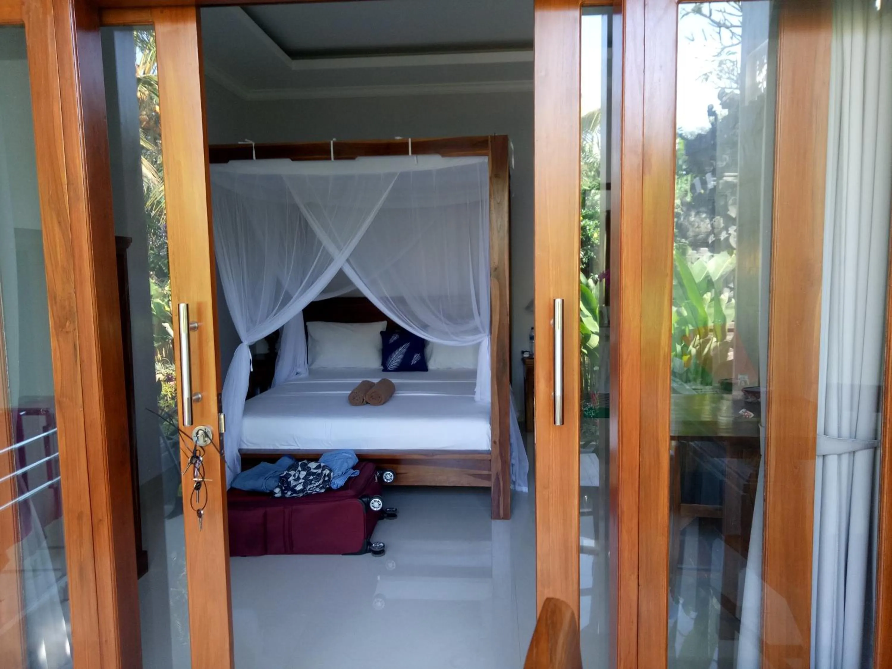 Bed in Suryadina Guest House