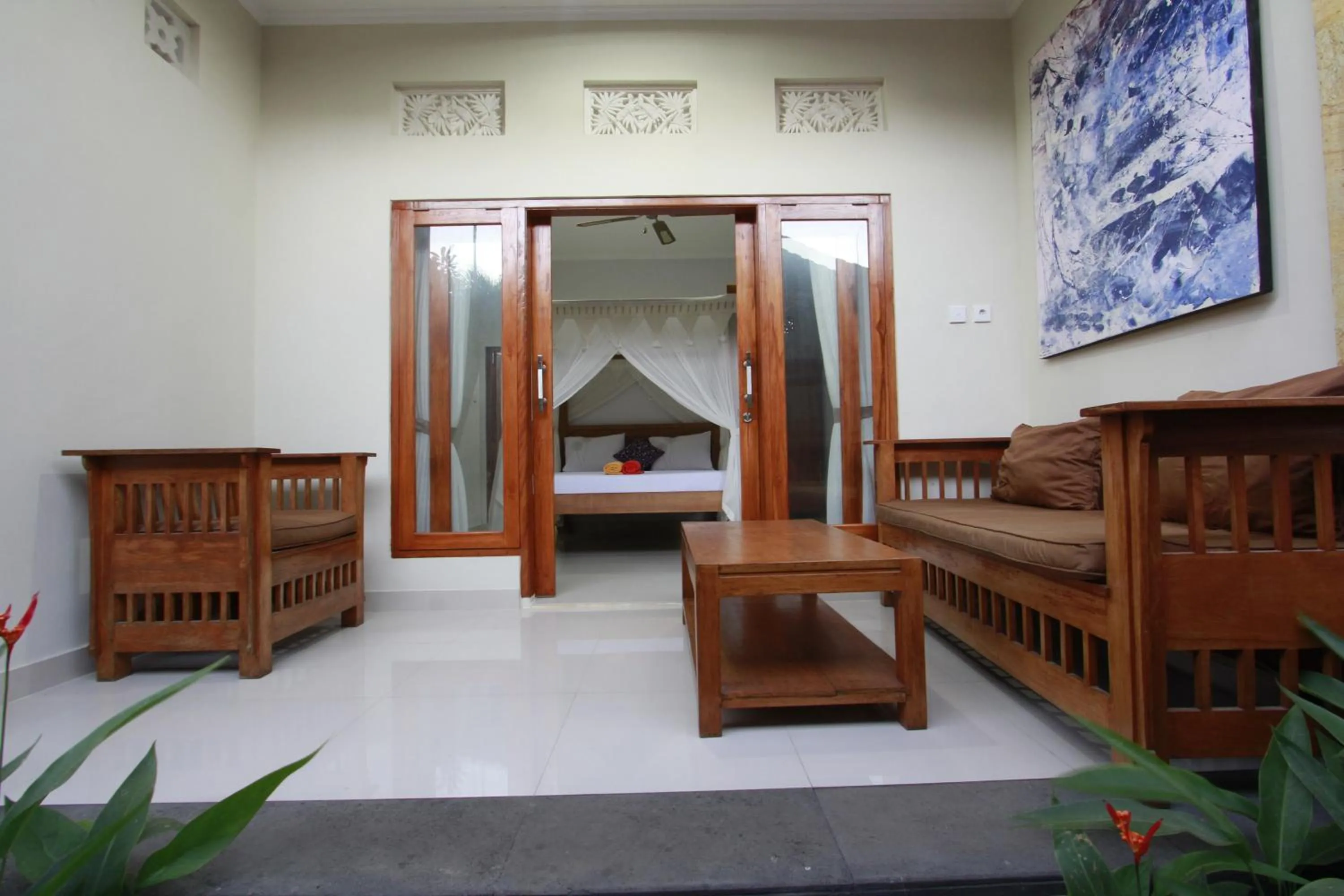 Balcony/Terrace, Bed in Suryadina Guest House