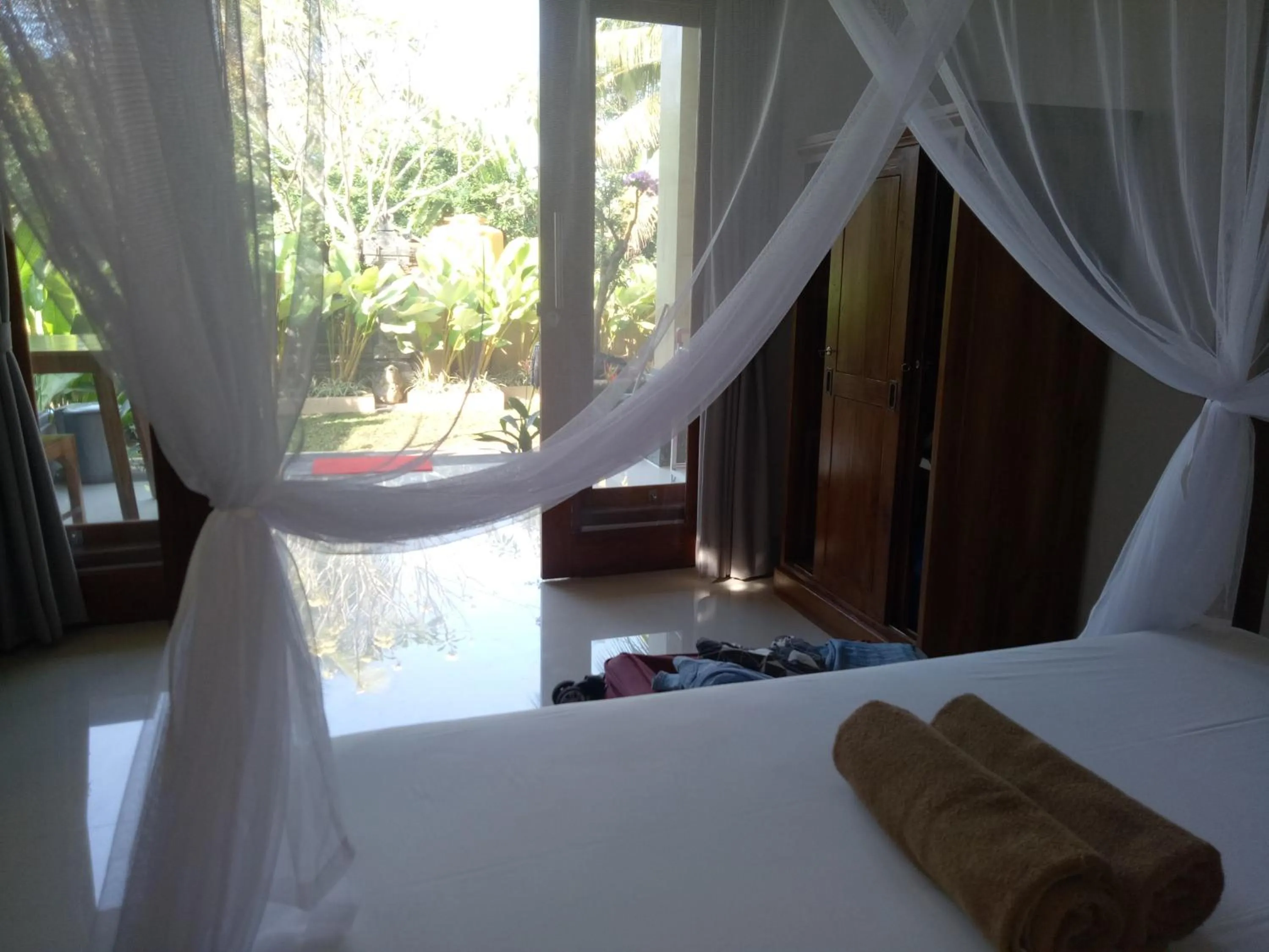 Bed in Suryadina Guest House