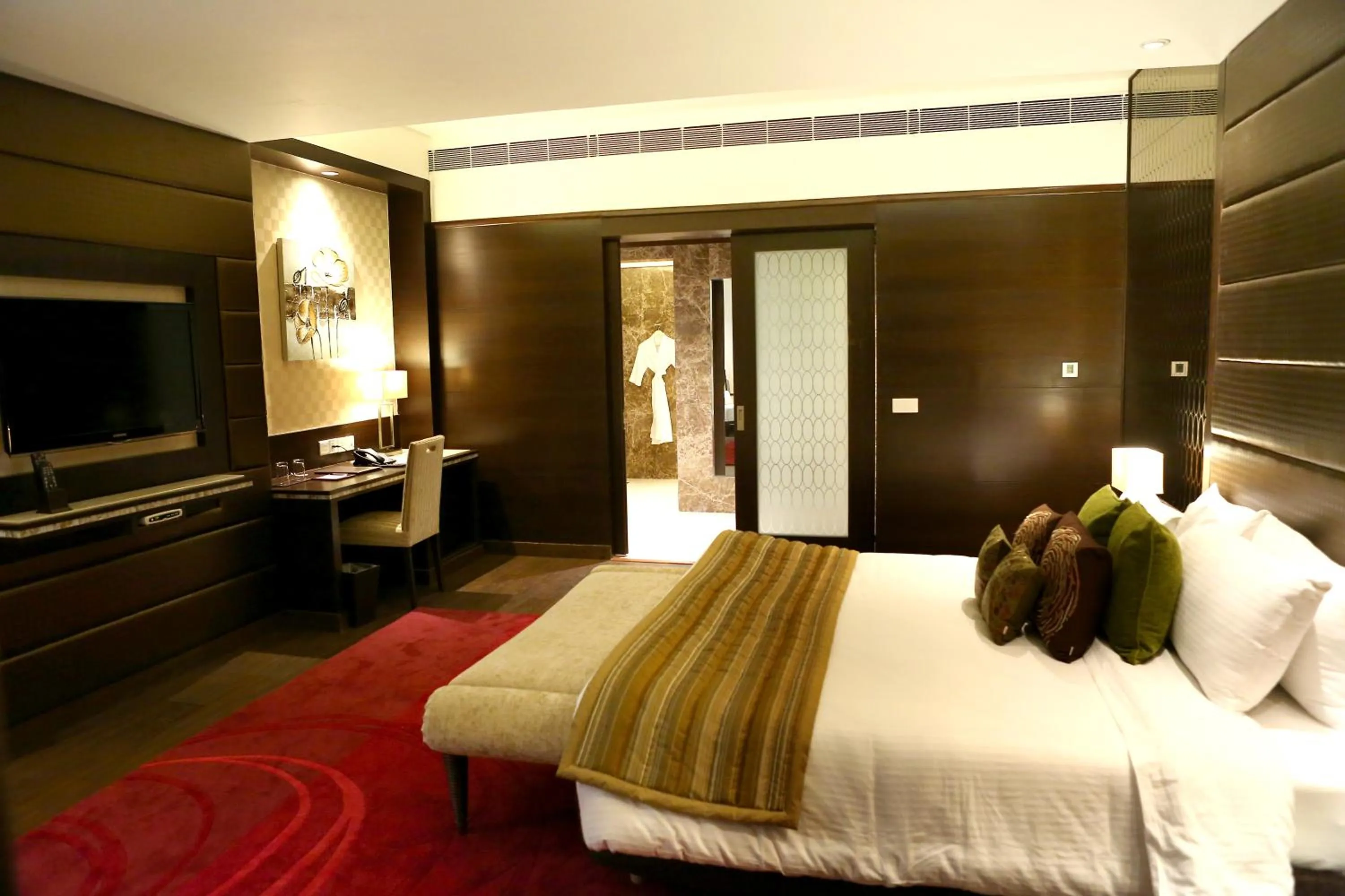 Photo of the whole room, Bed in The Landmark Towers