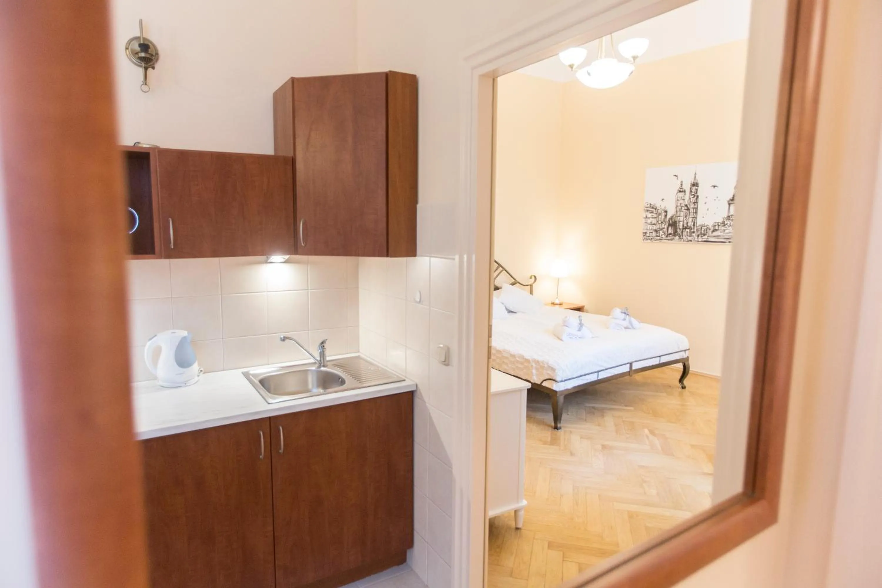 Kitchen or kitchenette, Bed in Apartments Roman