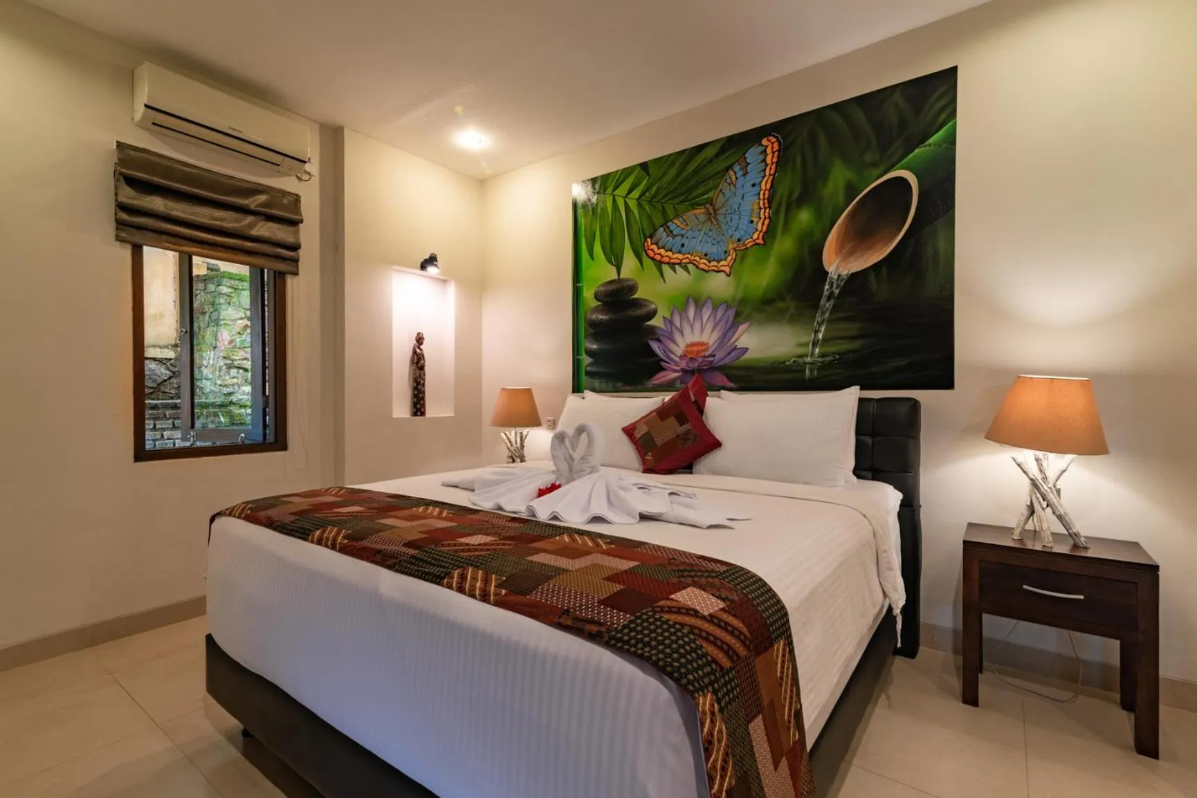 Bed in Alamanda Lovina Resort