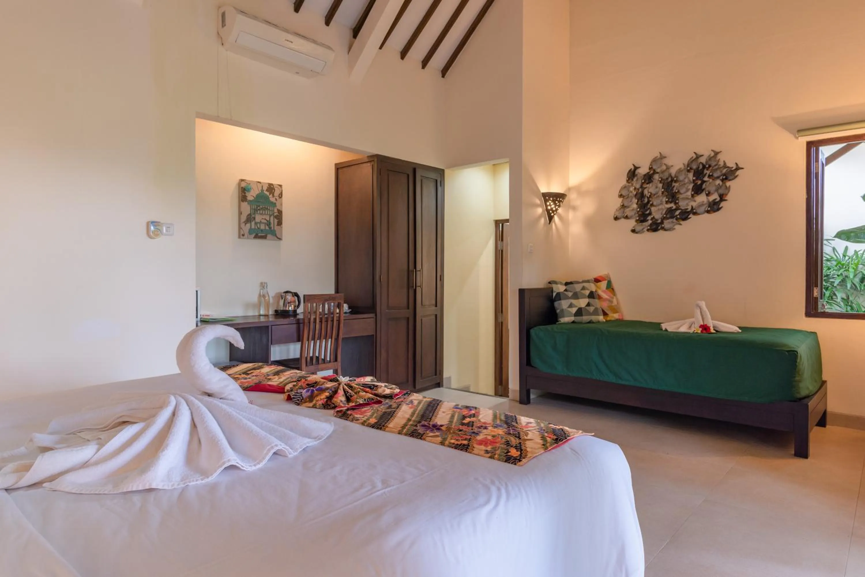 Bed in Alamanda Lovina Resort