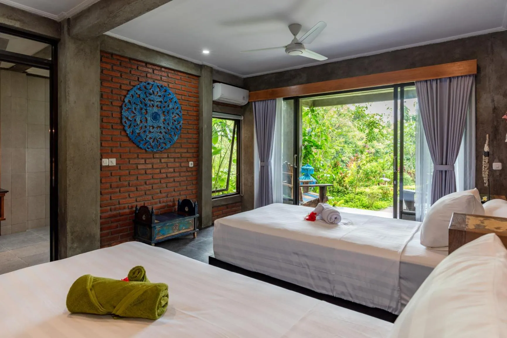 Photo of the whole room, Bed in Alamanda Lovina Resort