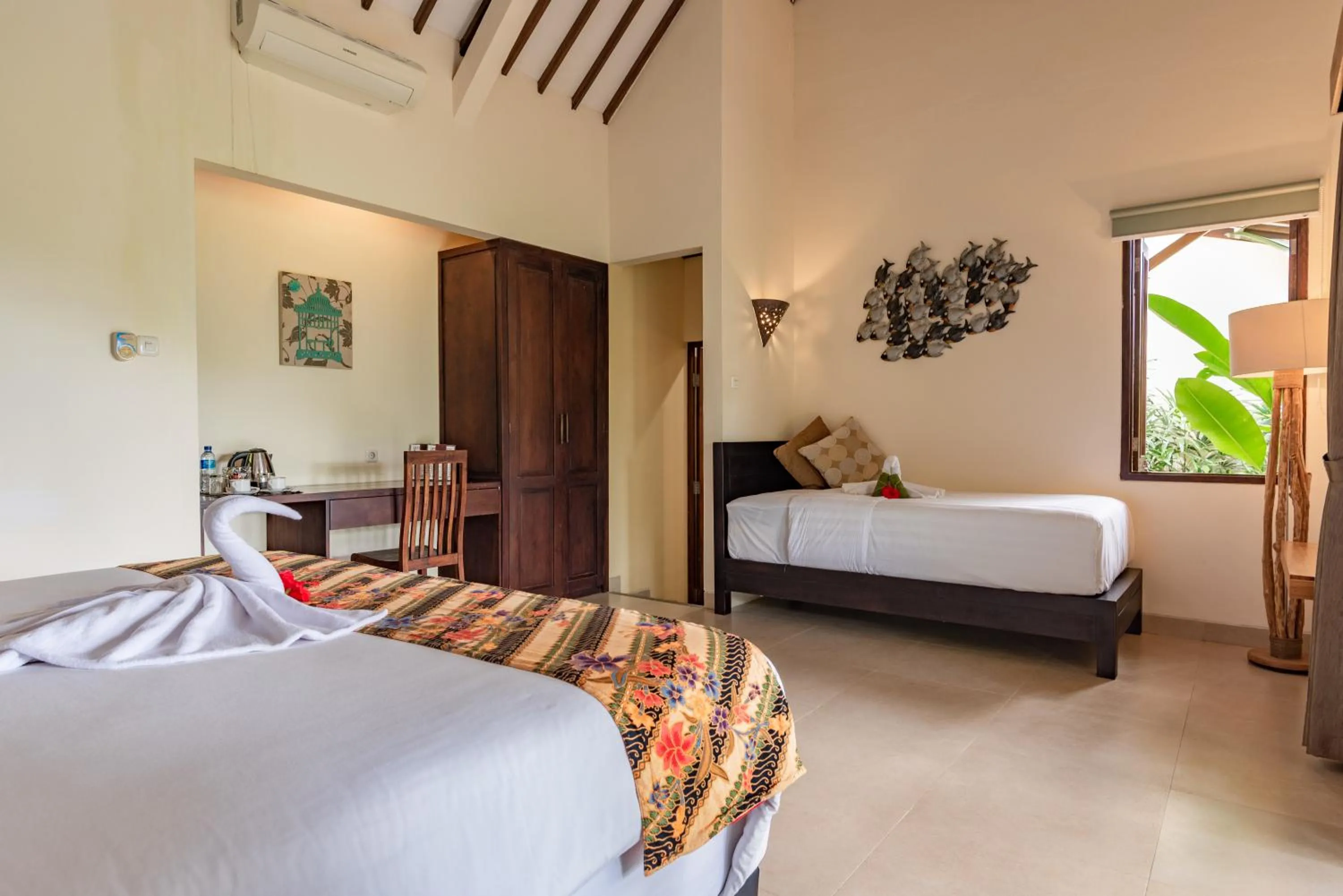 Bed in Alamanda Lovina Resort