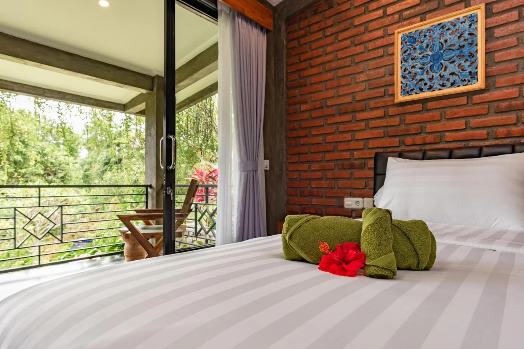 Bed in Alamanda Lovina Resort