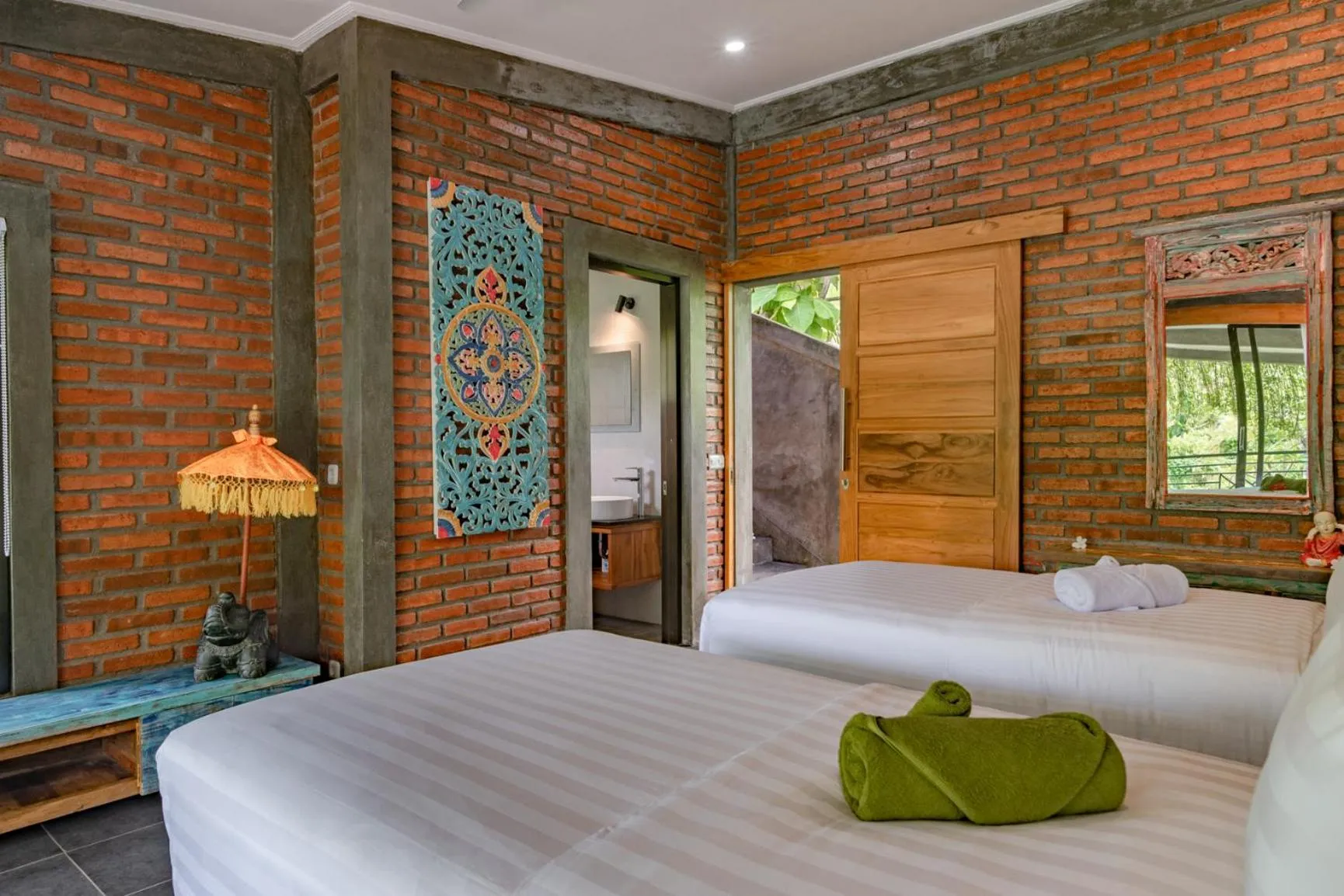 Bed in Alamanda Lovina Resort