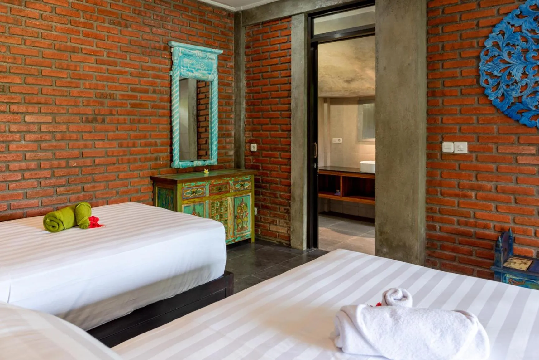 Bed in Alamanda Lovina Resort