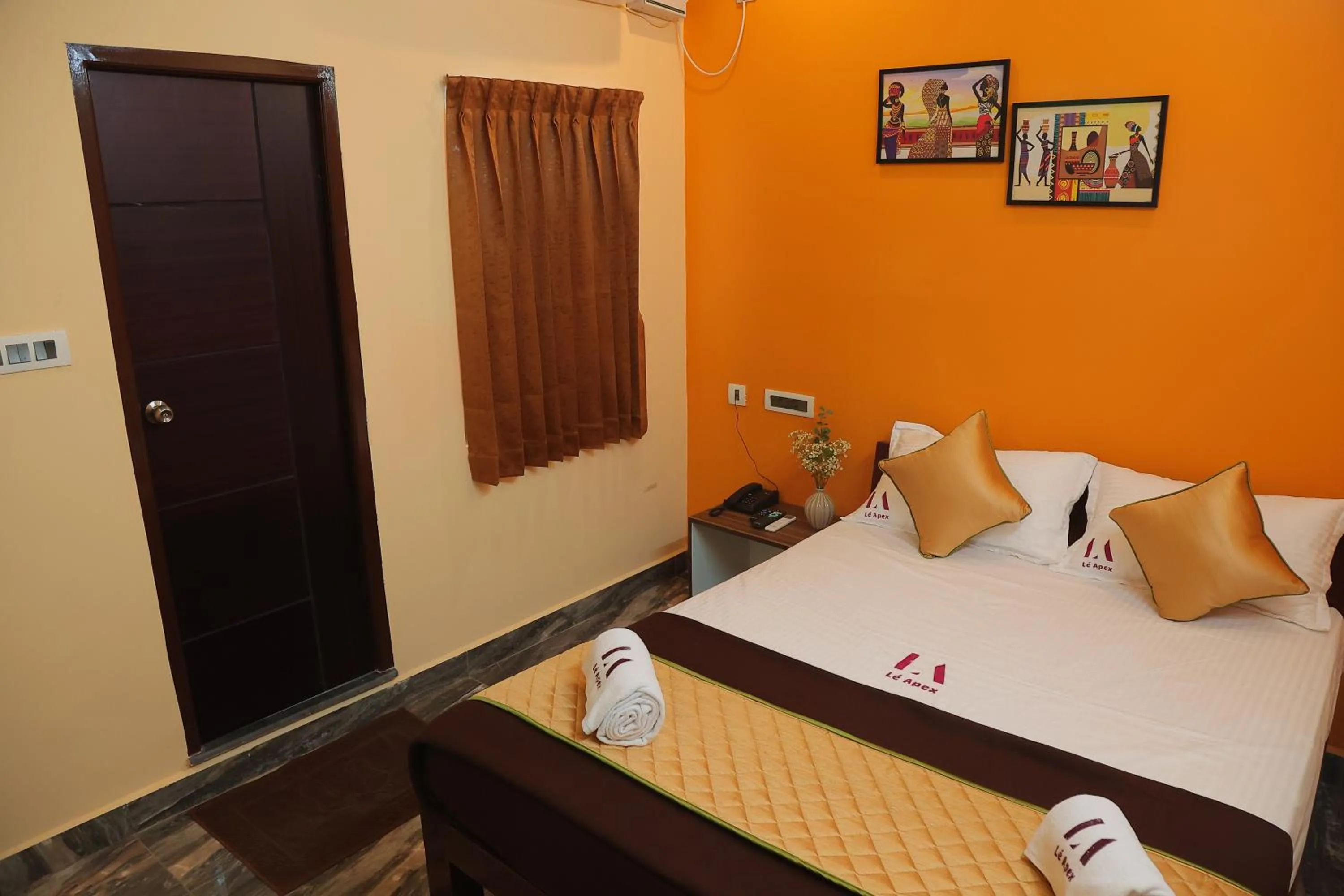 Bed in Le Apex Tharavaadu