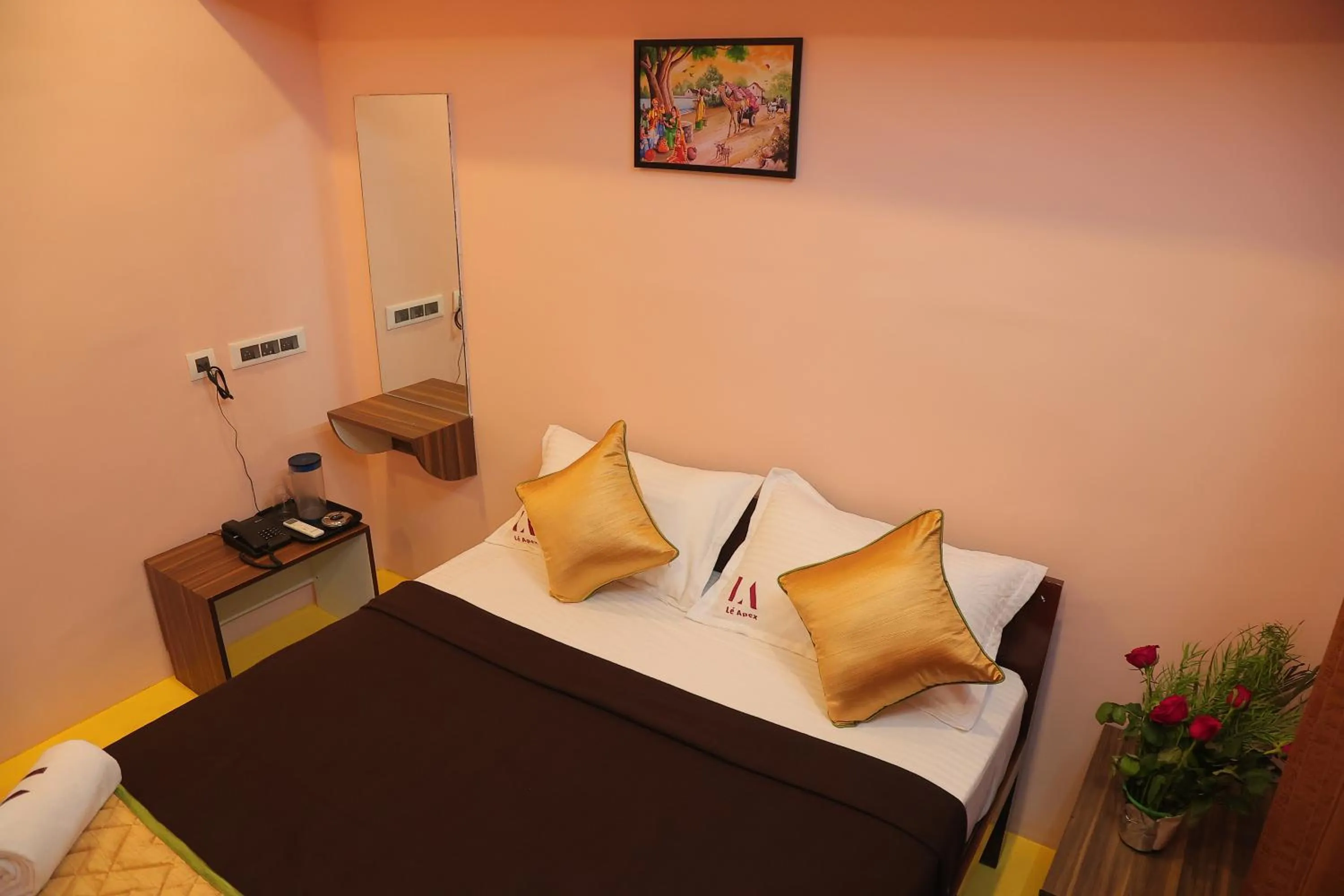 Bed in Le Apex Tharavaadu