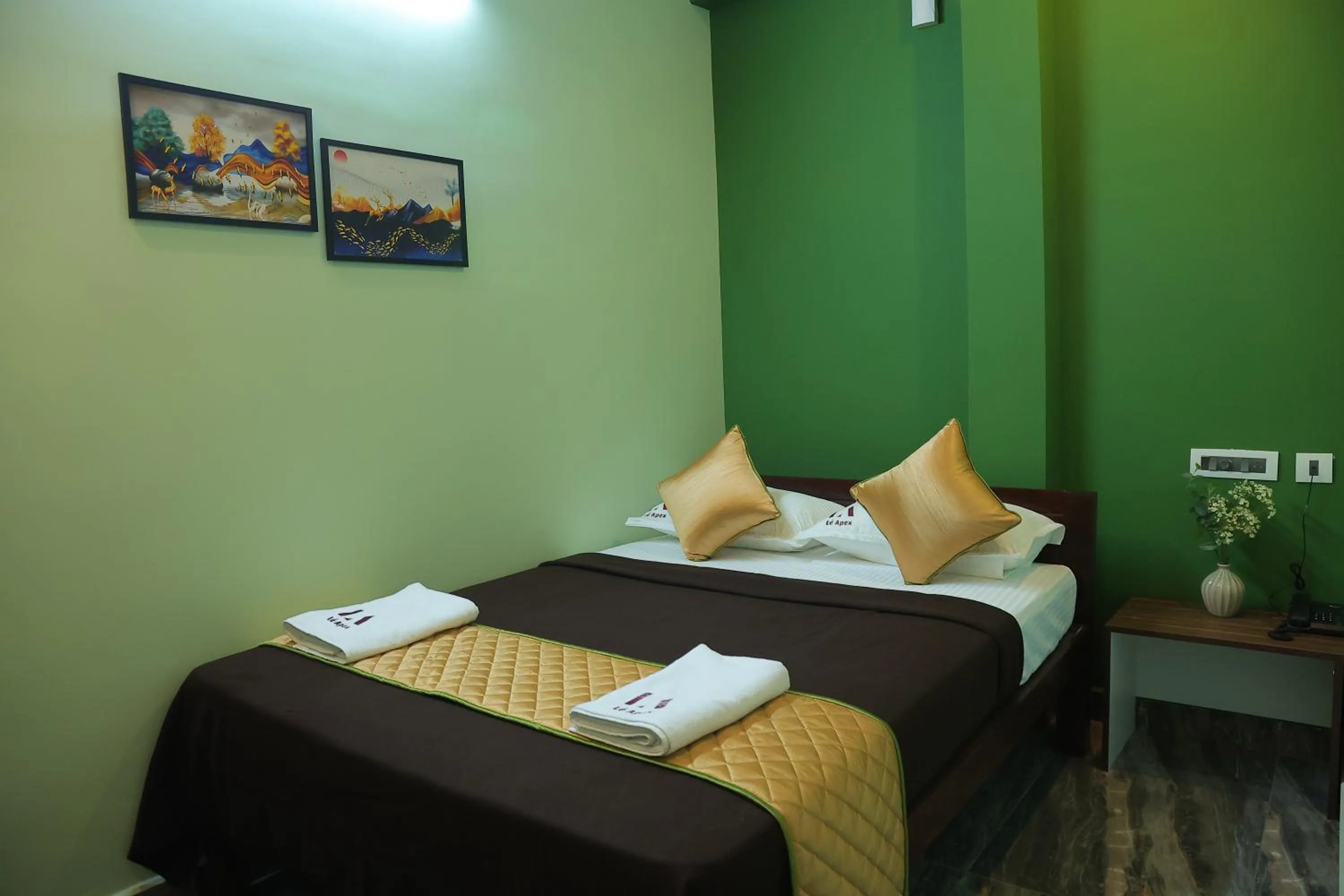 Bed in Le Apex Tharavaadu