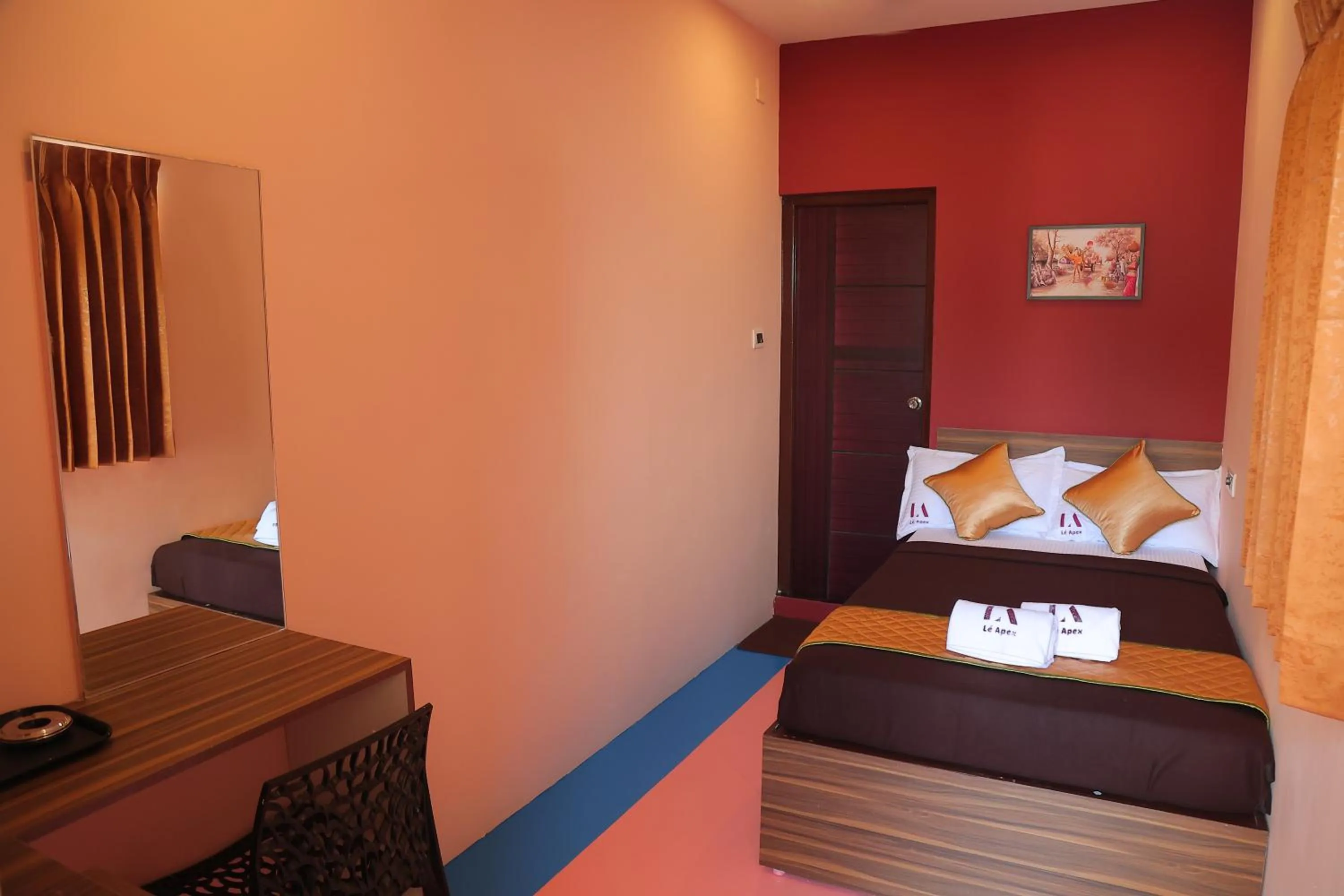 Bed in Le Apex Tharavaadu