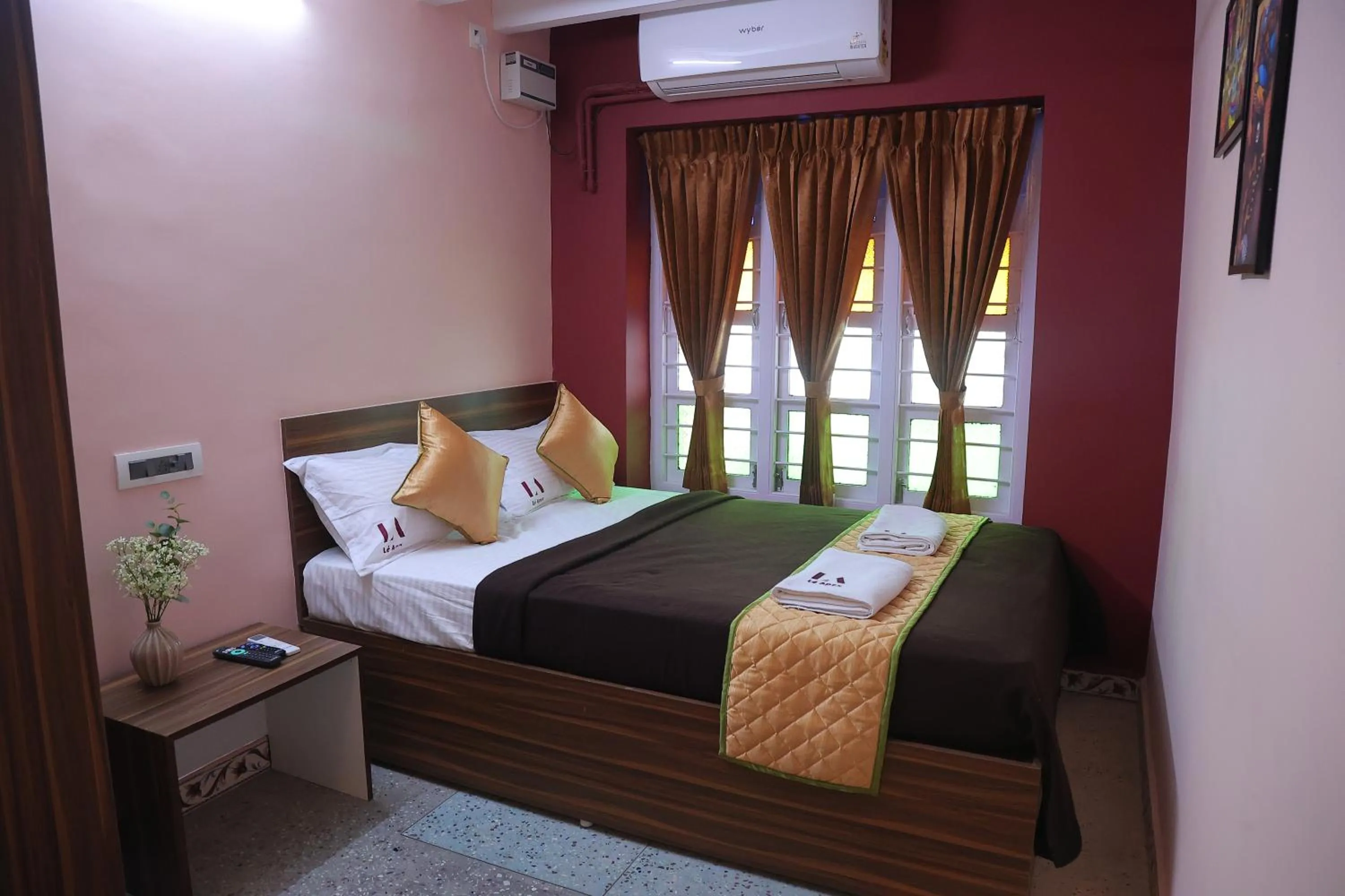 Bed in Le Apex Tharavaadu