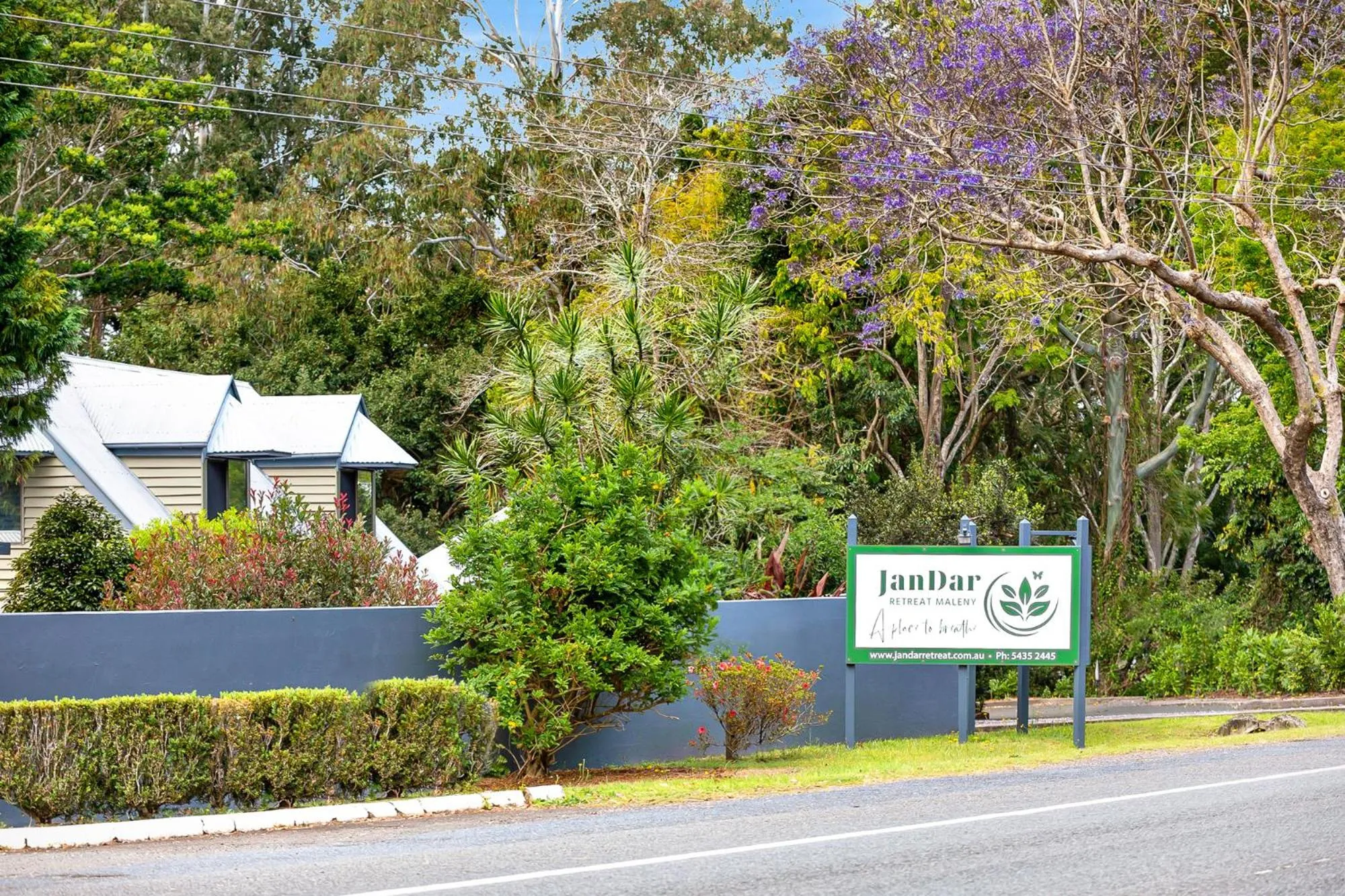 Property logo or sign in Jandar Retreat Maleny