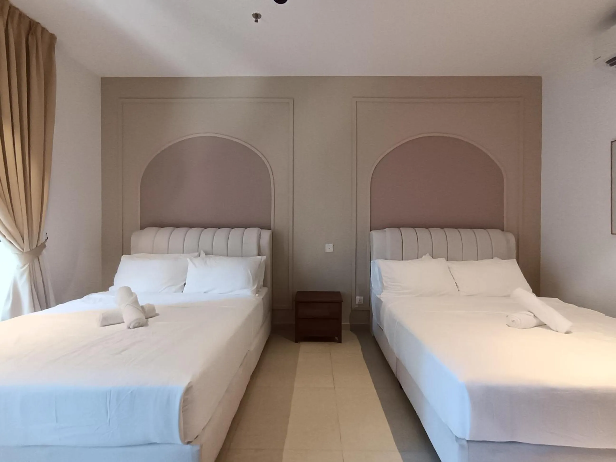 Bed in The Paxtonz by Manhattan Group