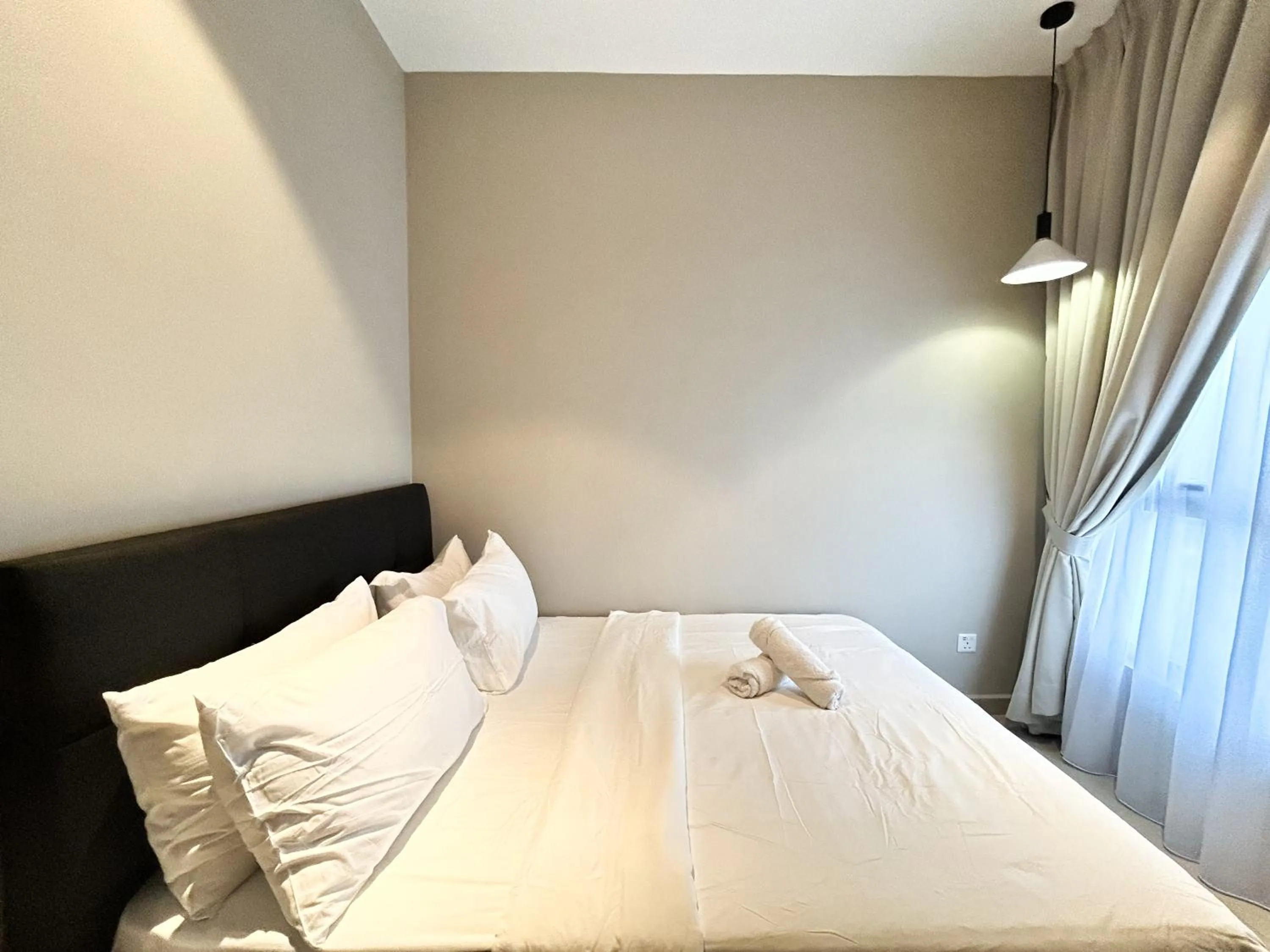 Bed in The Paxtonz by Manhattan Group