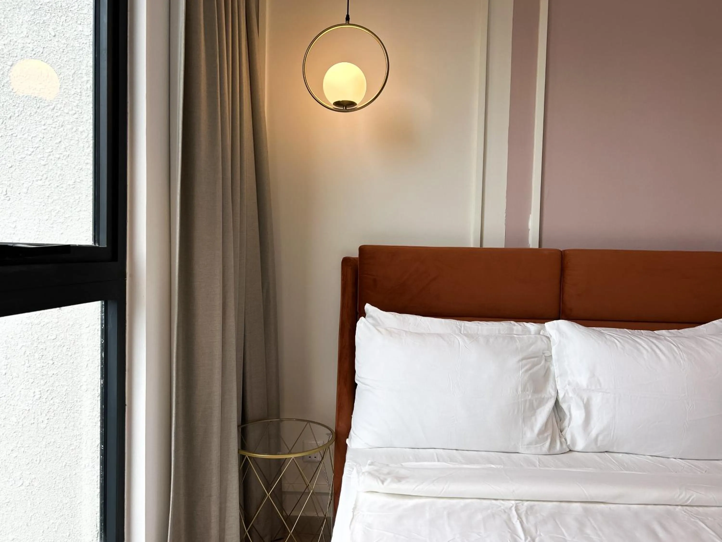 Bed in The Paxtonz by Manhattan Group