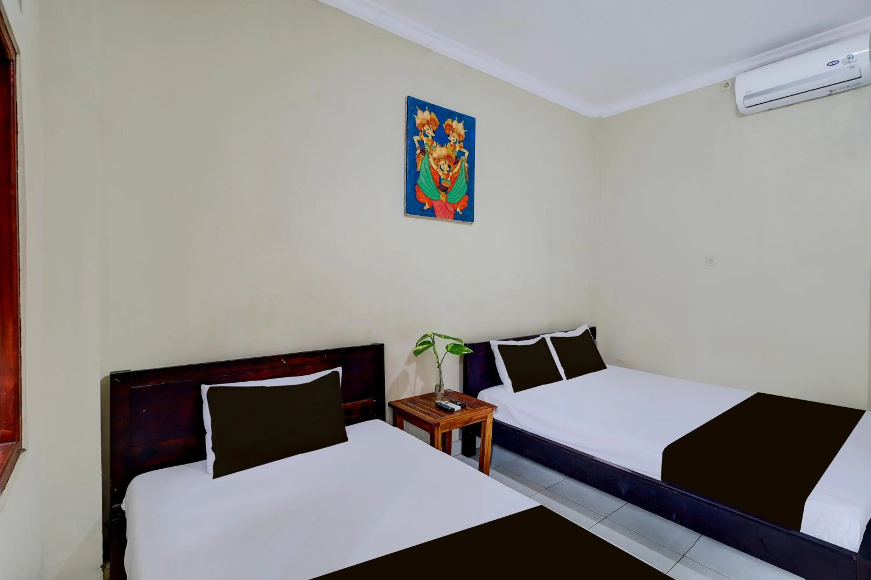 Photo of the whole room, Bed in Collection O Budget Door Legian Inn @Poppies Road