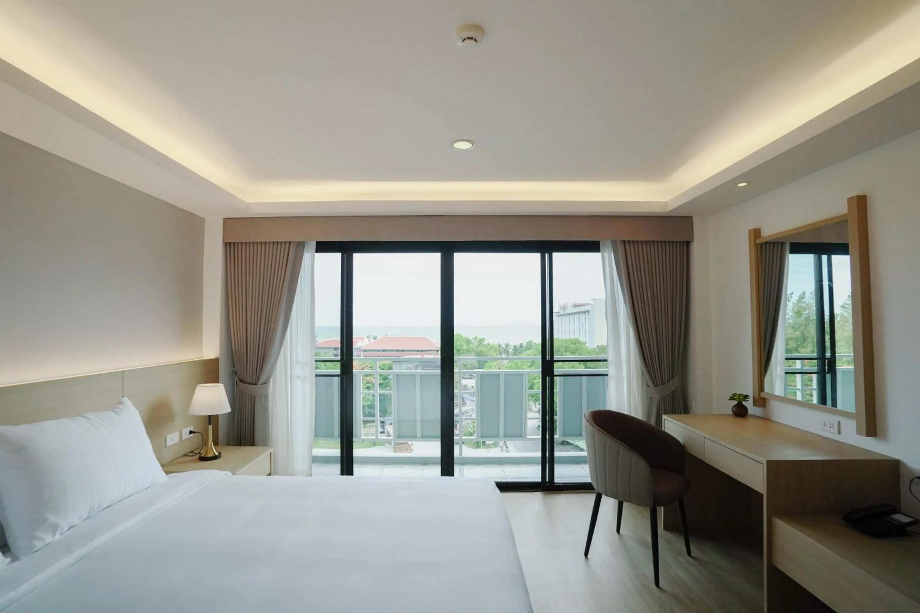 Bed in The Kite Hotel Bangsaen by Koko