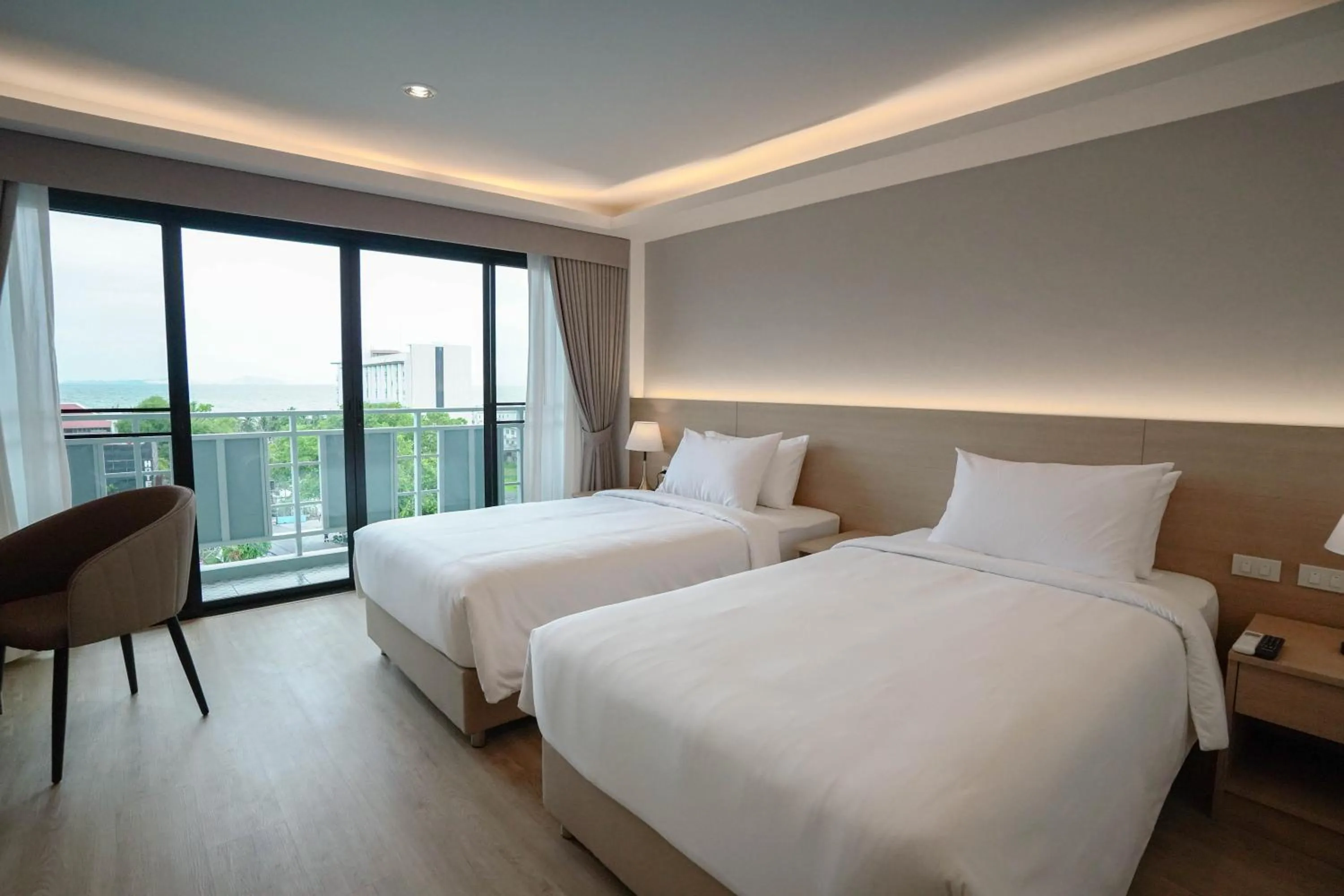 Bed in The Kite Hotel Bangsaen by Koko