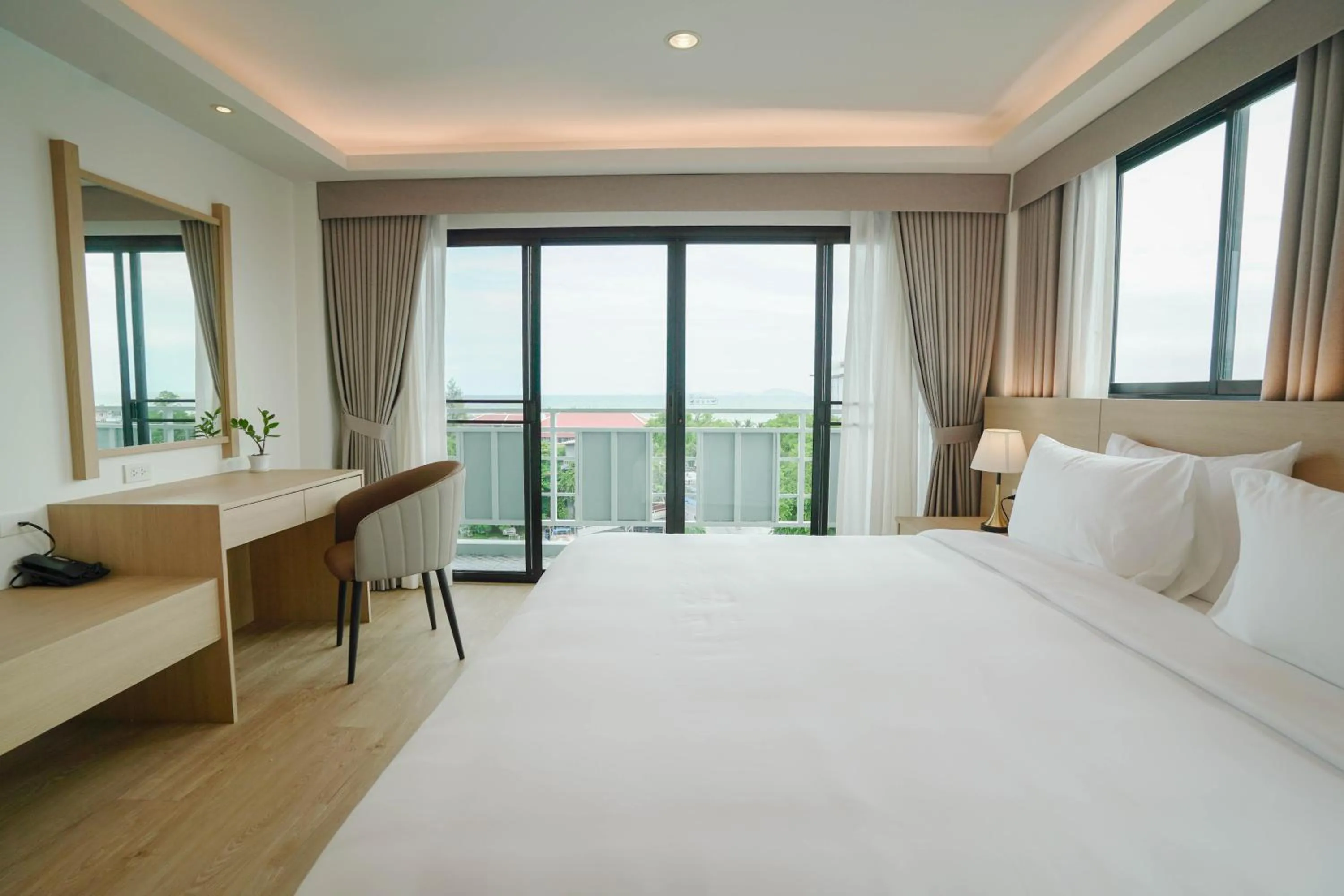 Bed in The Kite Hotel Bangsaen by Koko