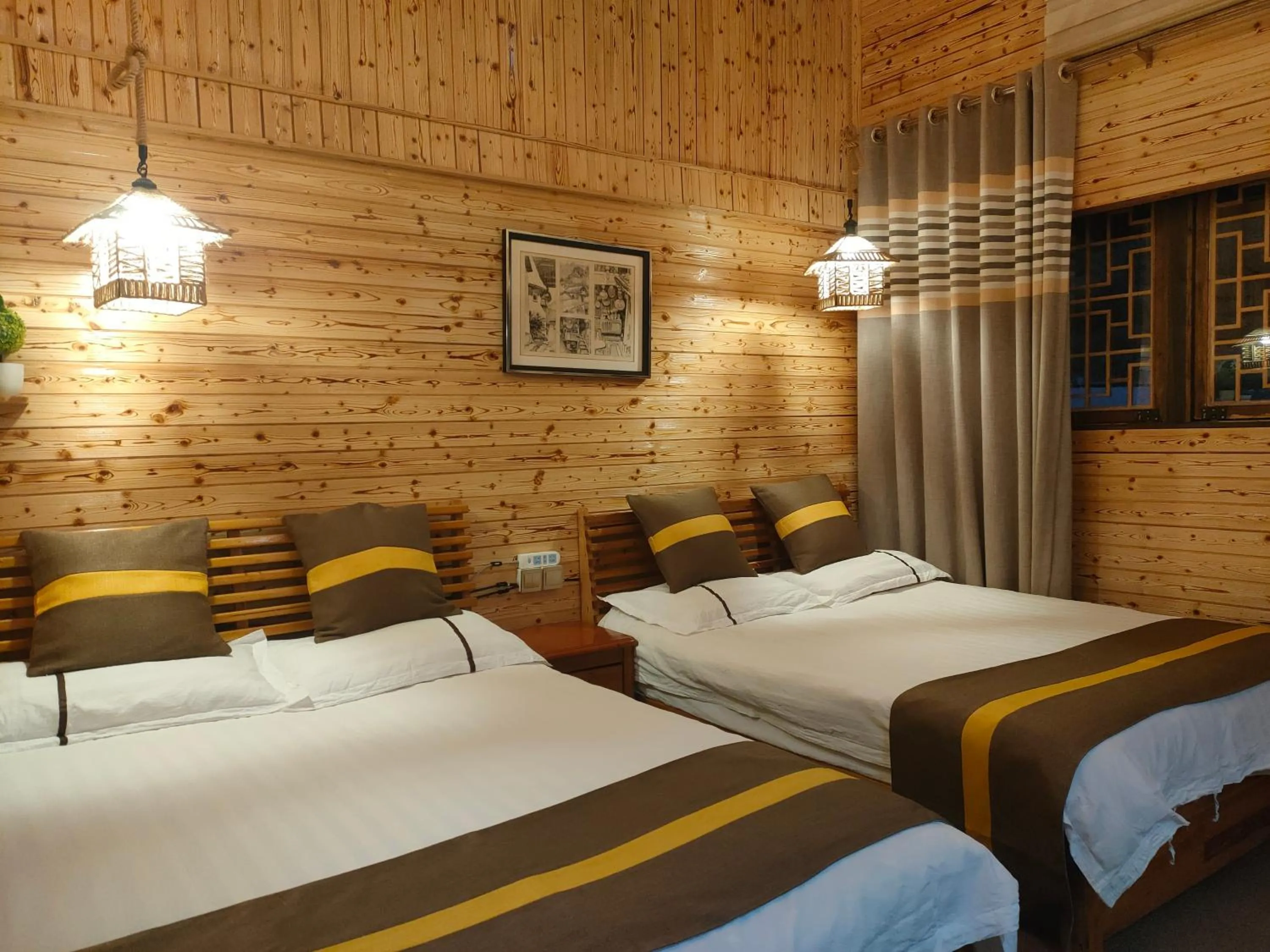 Bed in Nanjing Tulou Qingdelou Inn