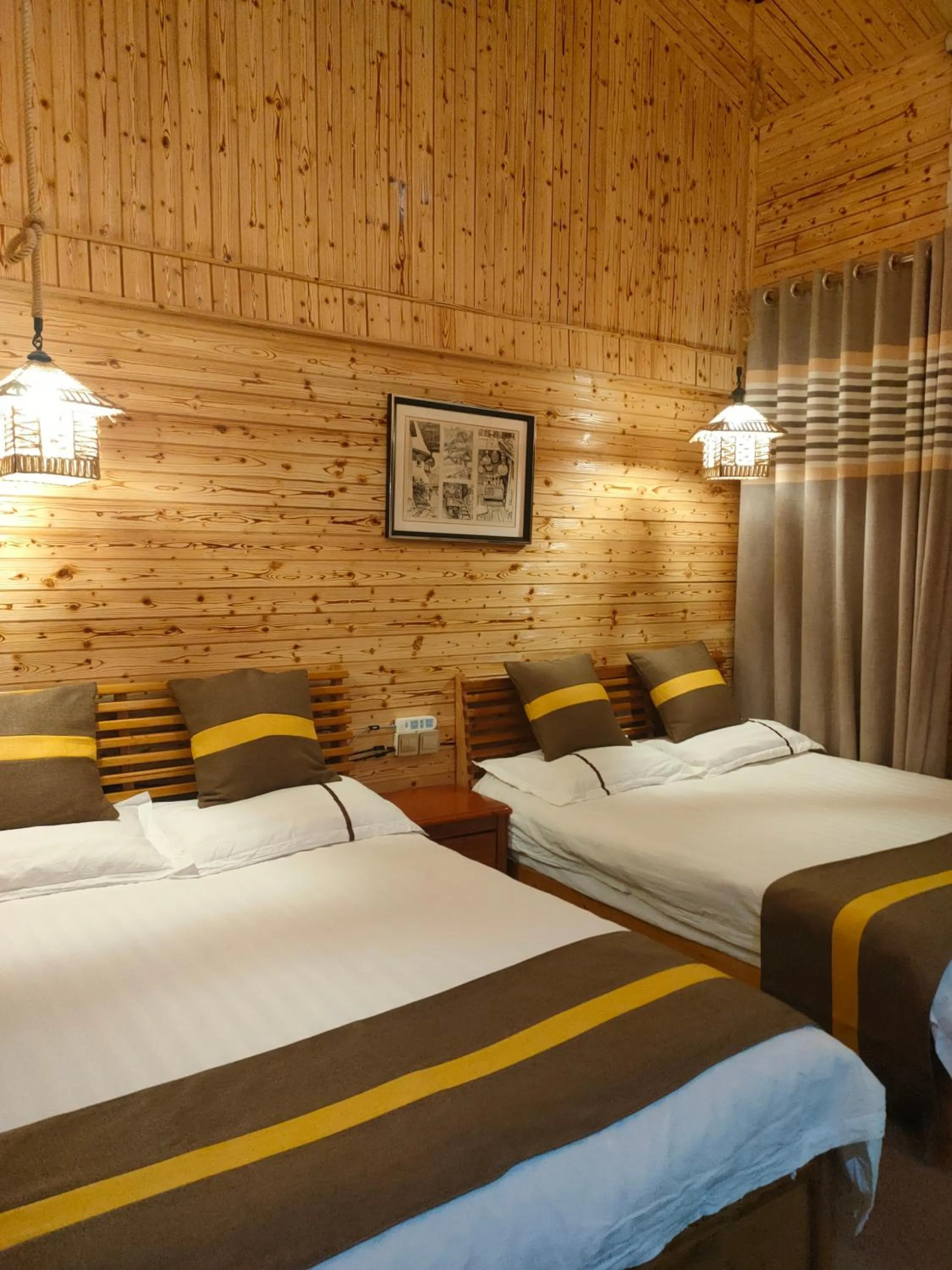 Bed in Nanjing Tulou Qingdelou Inn