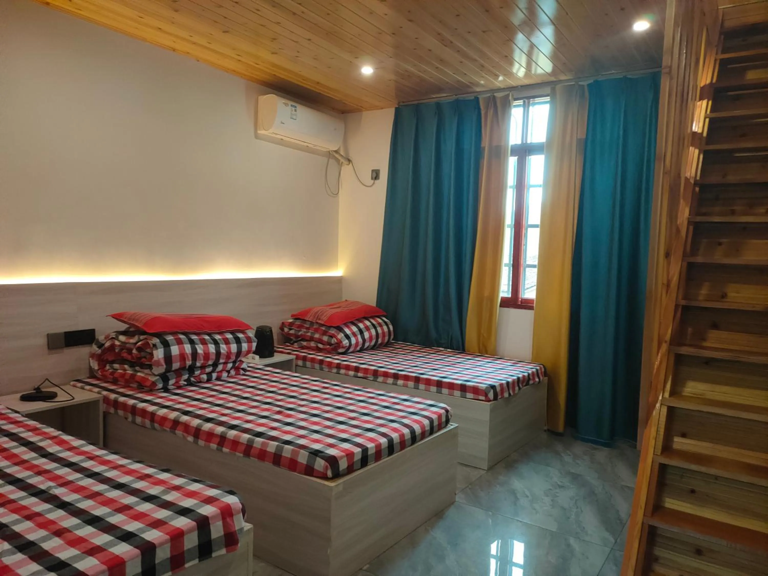 Bed in Nanjing Tulou Qingdelou Inn